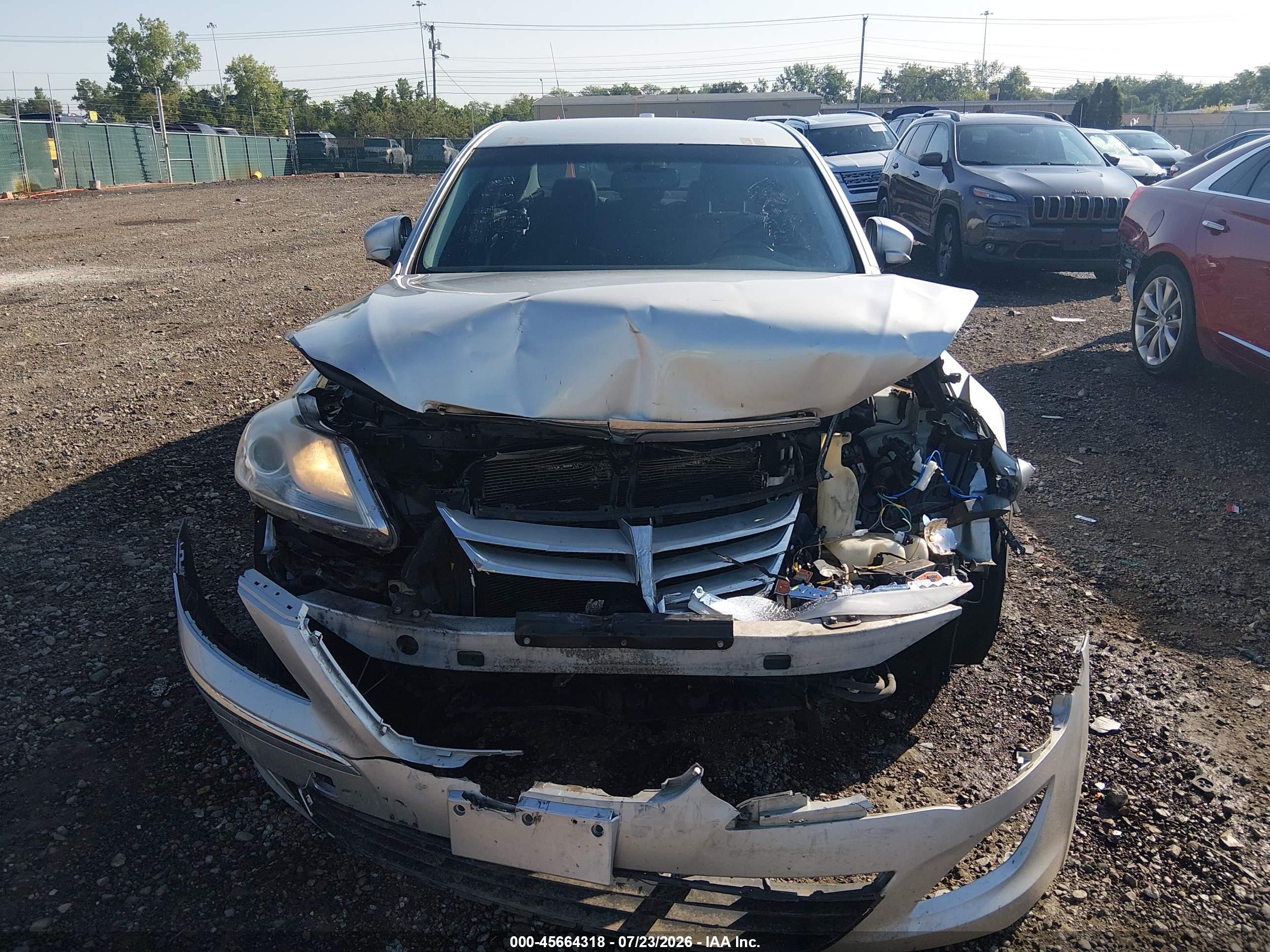 2012 Hyundai Genesis 3.8 Silver vin: KMHGC4DD0CU198033