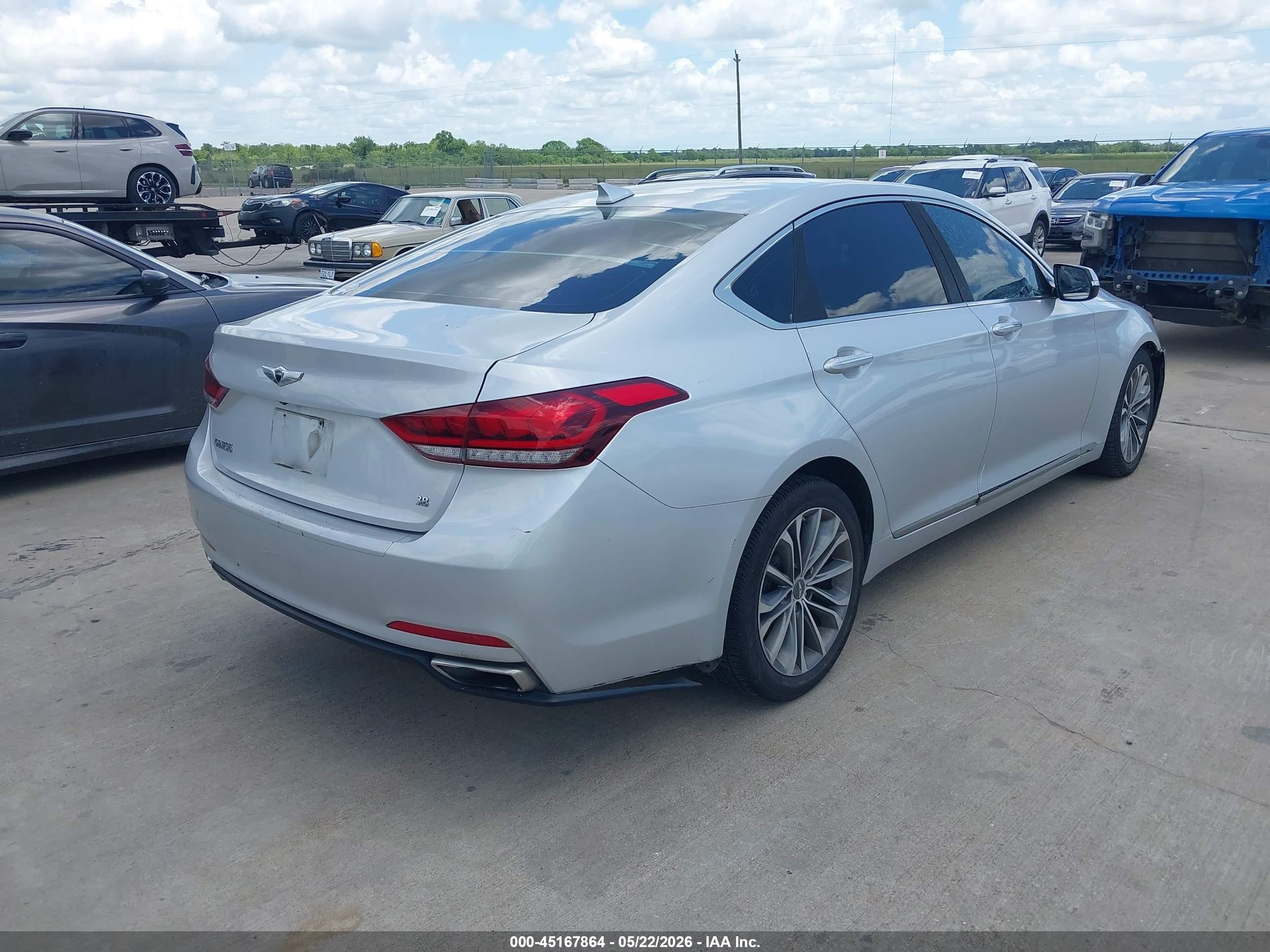 2016 Hyundai Genesis 3.8 Silver vin: KMHGN4JE8GU143553
