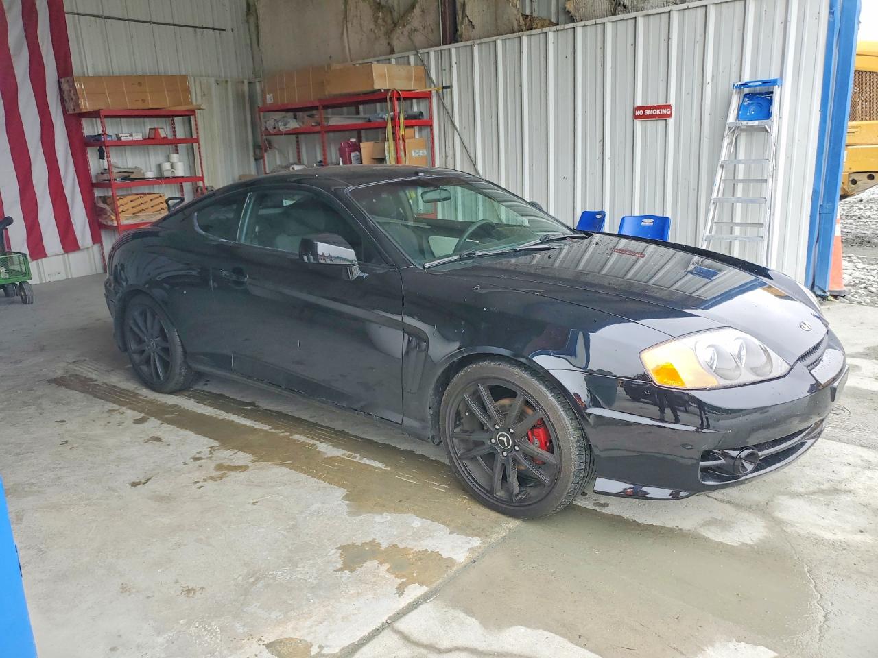 2004 Hyundai Tiburon Base Black vin: KMHHM65D04U107498
