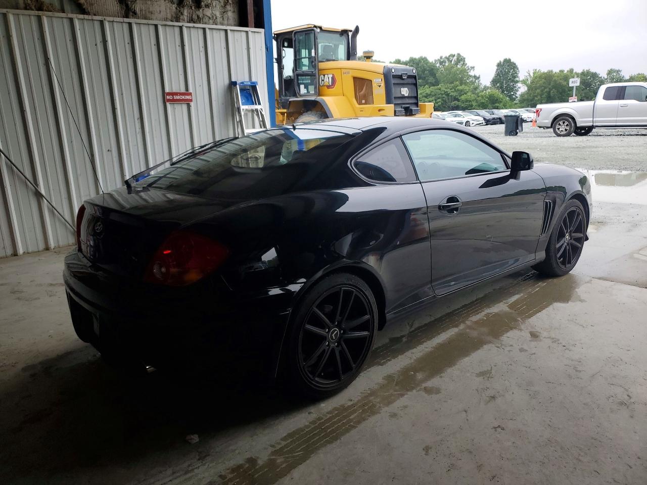 2004 Hyundai Tiburon Base Black vin: KMHHM65D04U107498