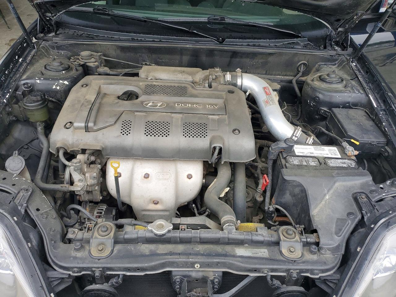 2004 Hyundai Tiburon Base Black vin: KMHHM65D04U107498