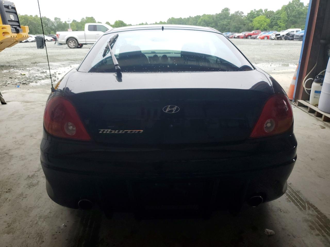 2004 Hyundai Tiburon Base Black vin: KMHHM65D04U107498