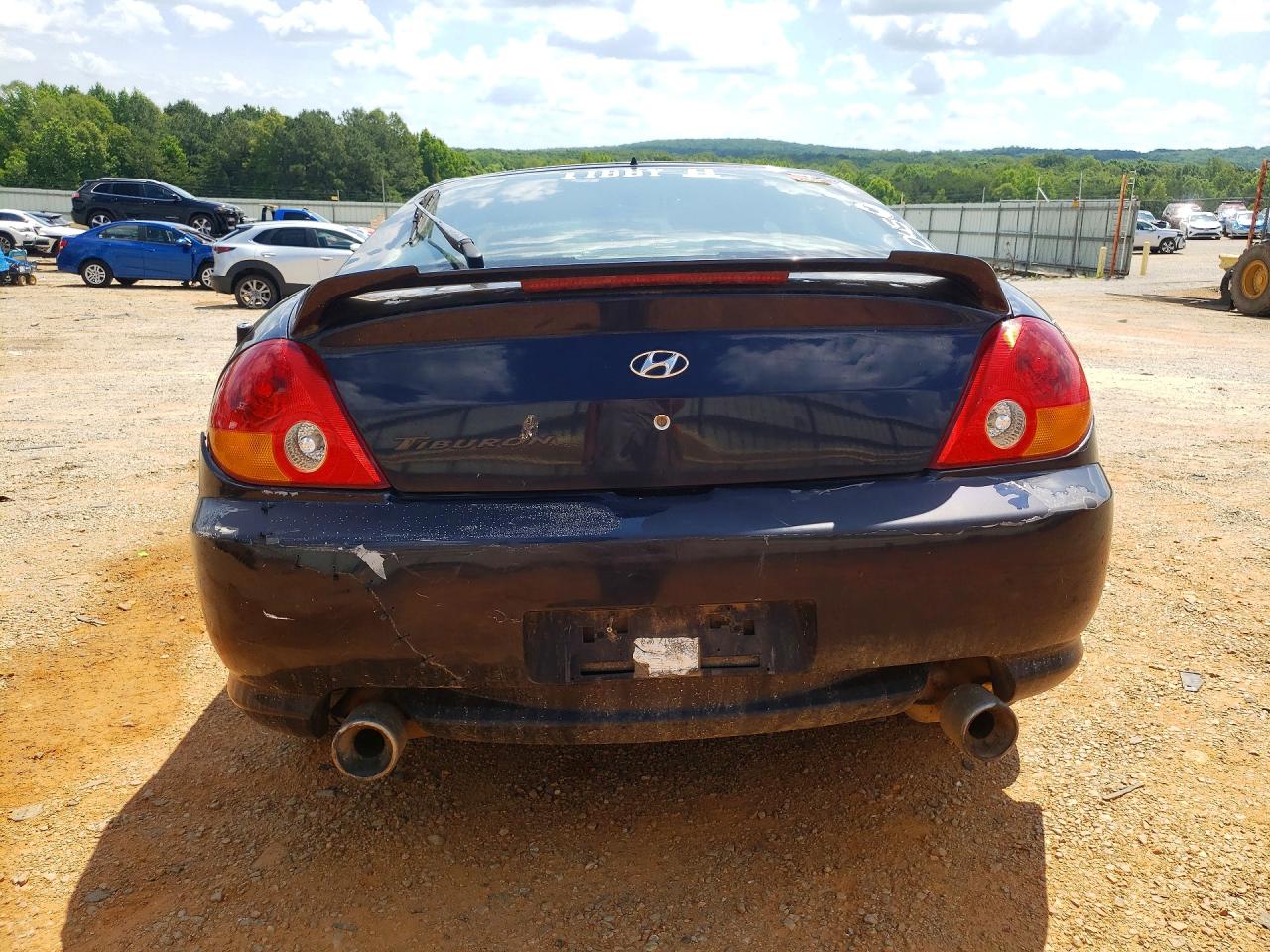 2004 Hyundai Tiburon Base Blue vin: KMHHM65D94U122808