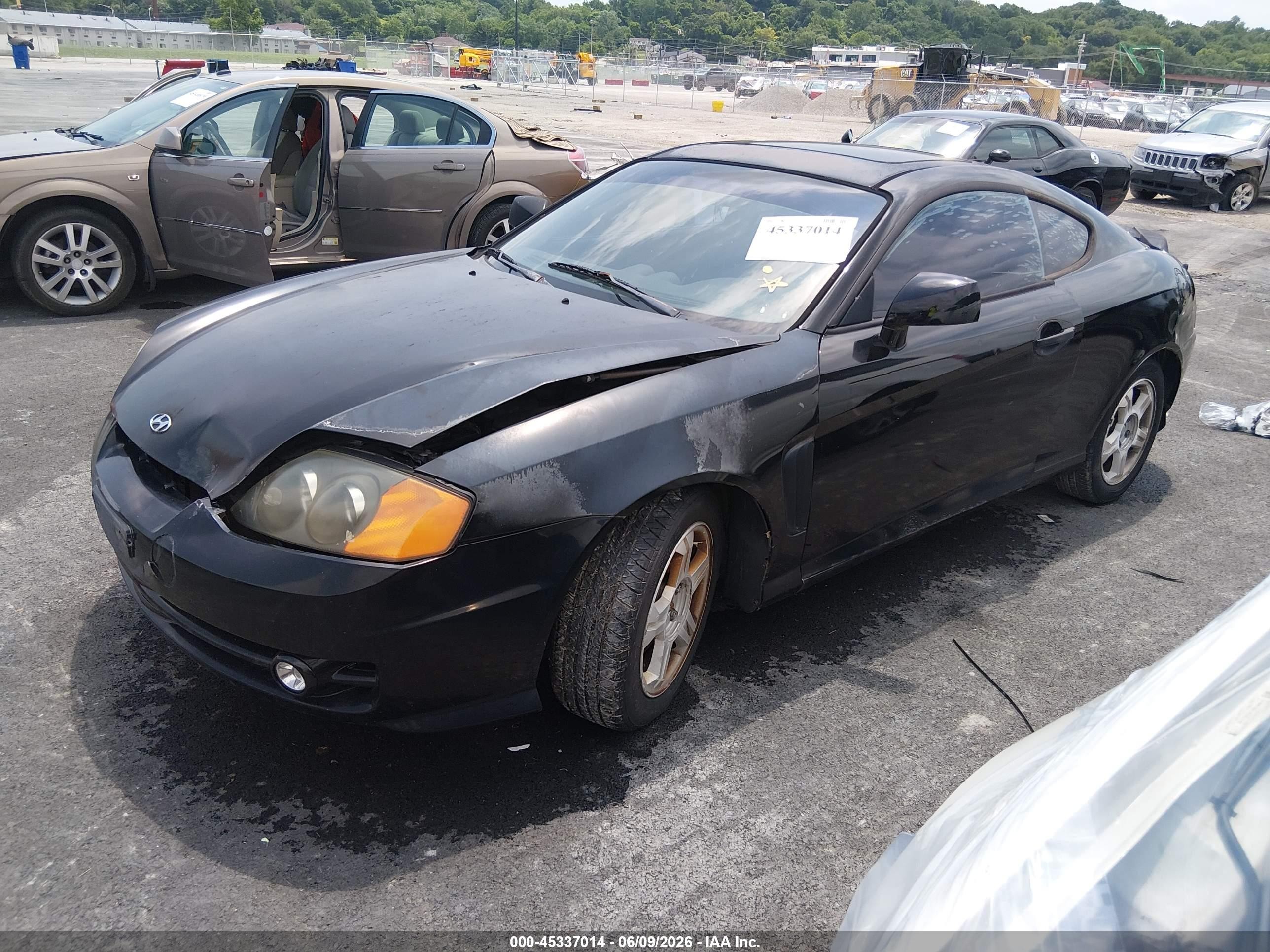 2004 Hyundai Tiburon   Black vin: KMHHM65DX4U107203