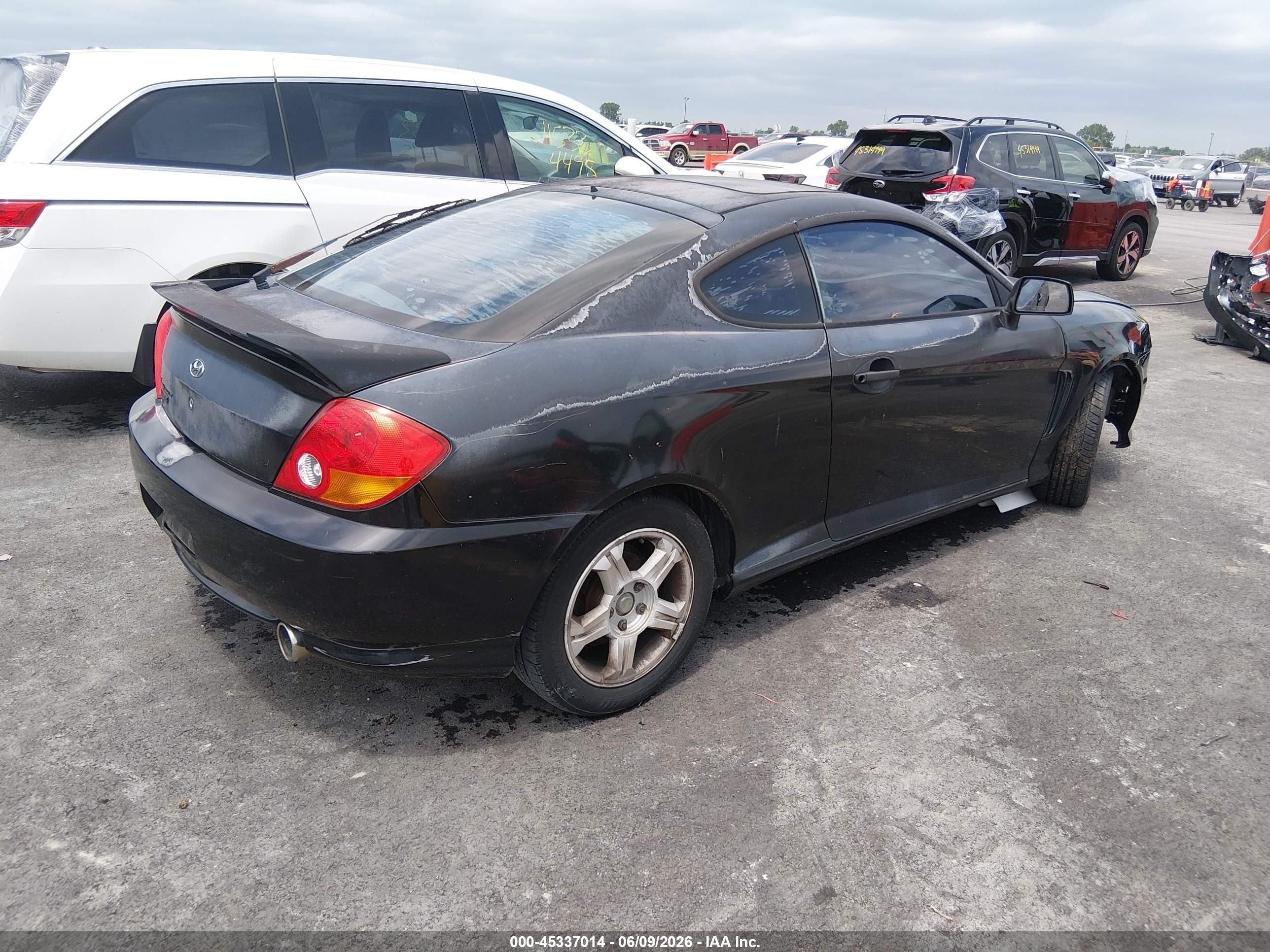 2004 Hyundai Tiburon   Black vin: KMHHM65DX4U107203