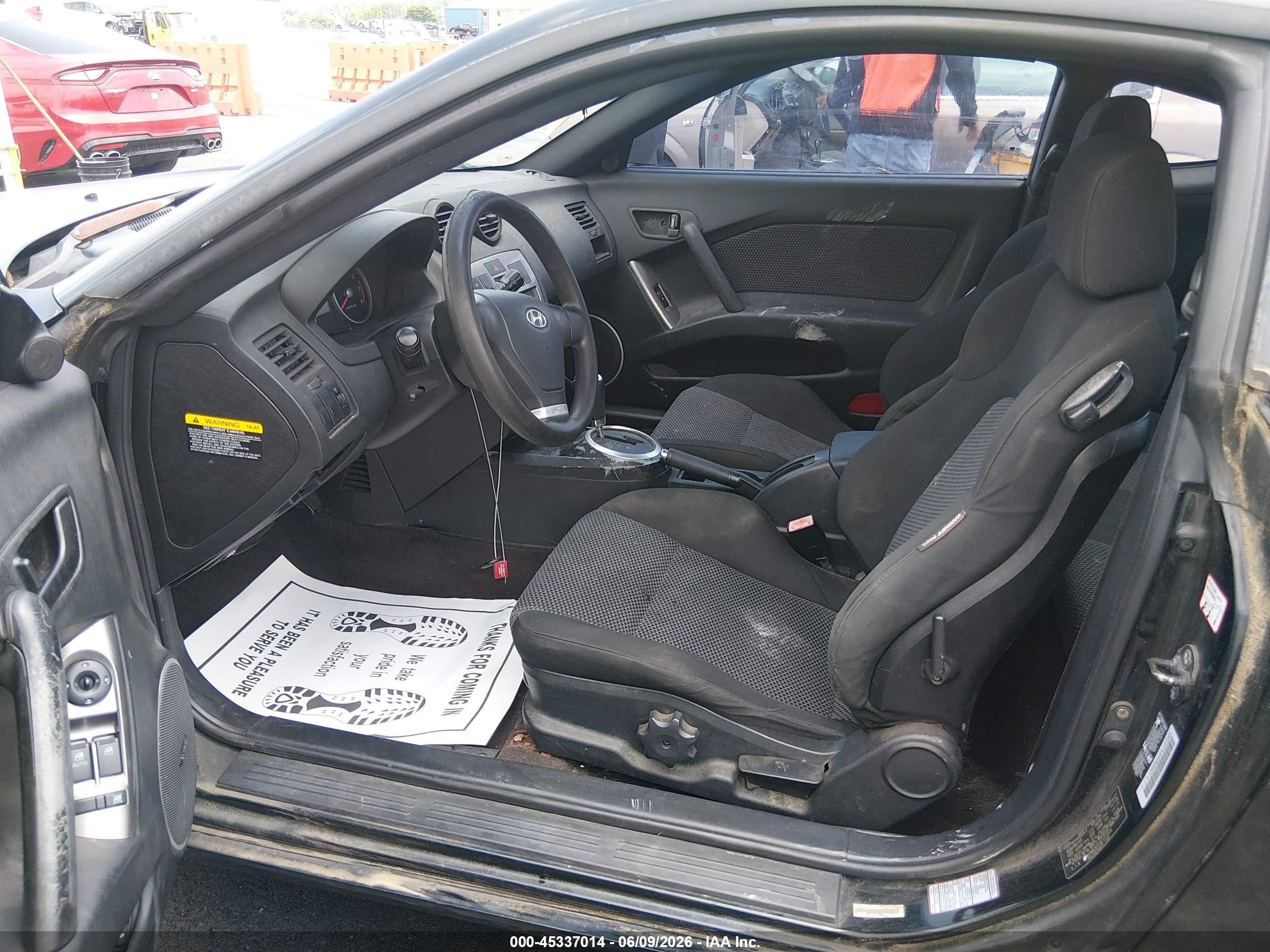 2004 Hyundai Tiburon   Black vin: KMHHM65DX4U107203