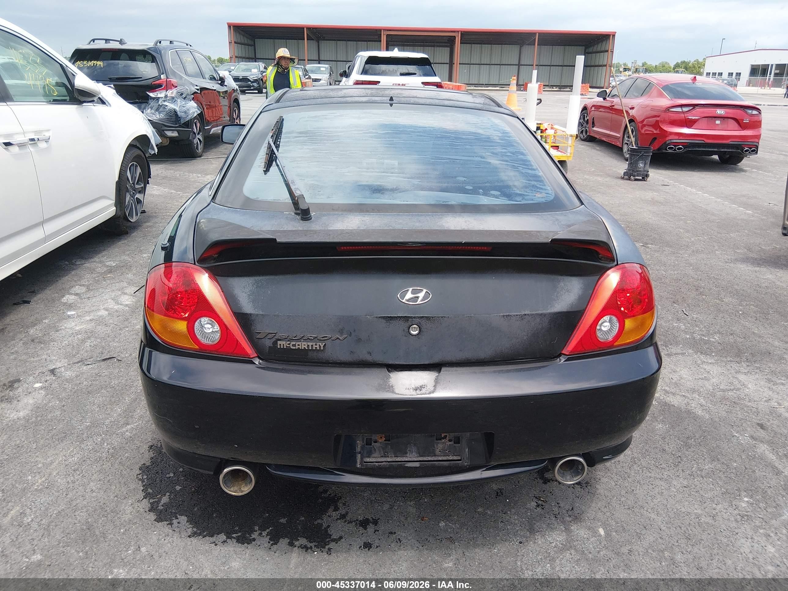 2004 Hyundai Tiburon   Black vin: KMHHM65DX4U107203