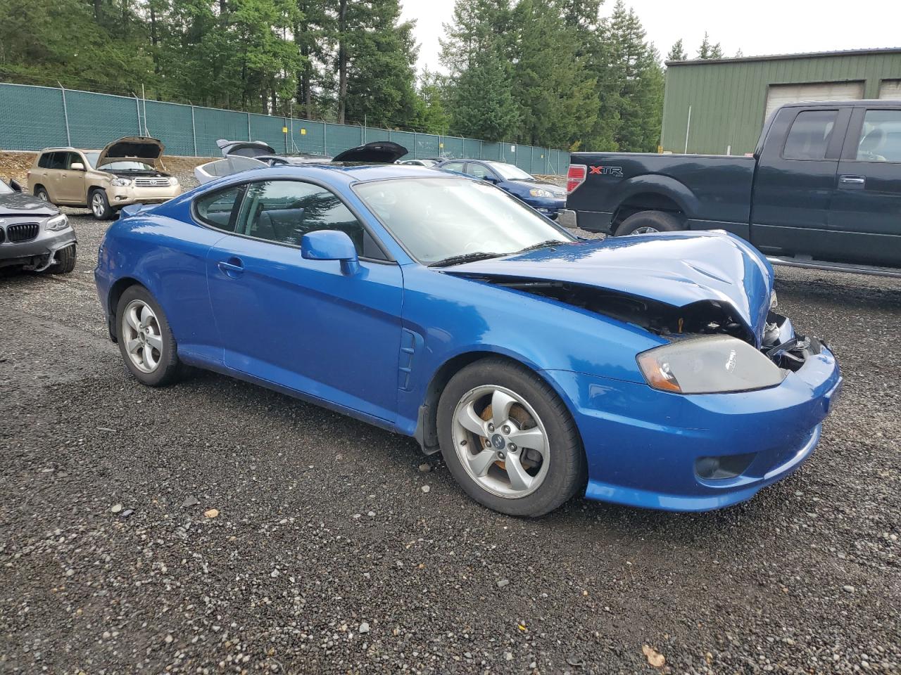 2005 Hyundai Tiburon Blue vin: KMHHM65DX5U168083