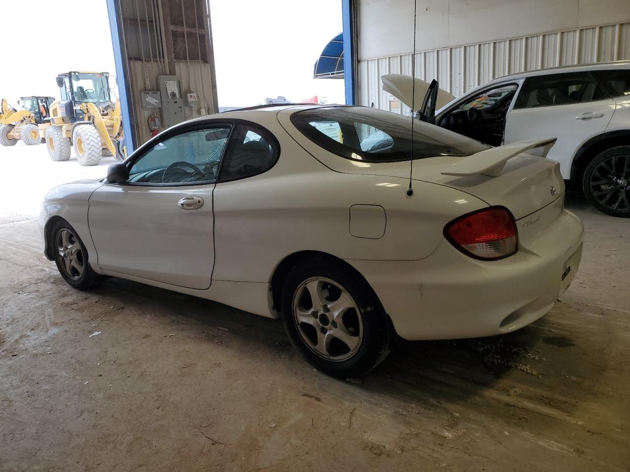 2000 Hyundai Tiburon  White vin: KMHJG25F1YU217419