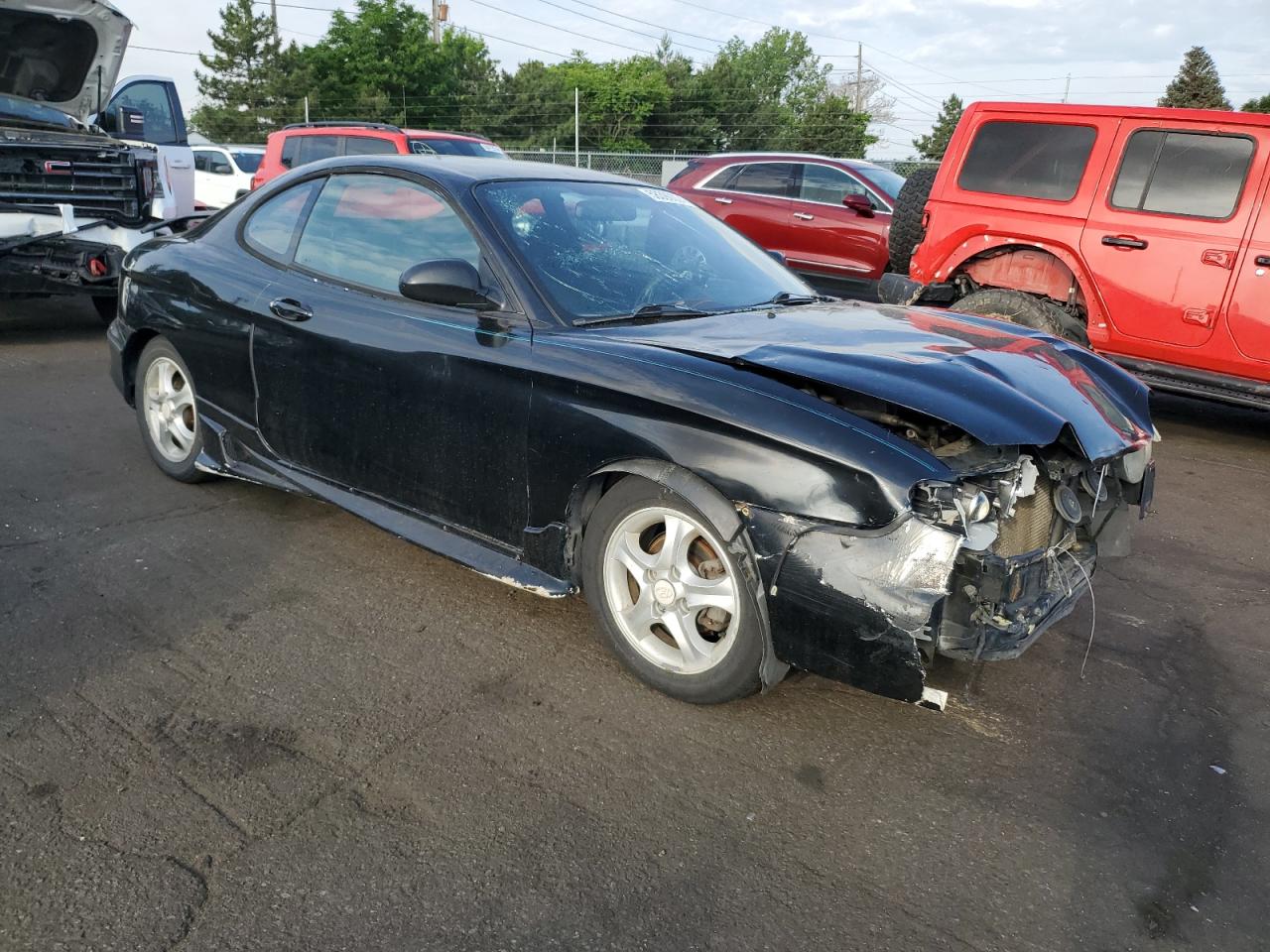 2001 Hyundai Tiburon  Black vin: KMHJG25F21U250094