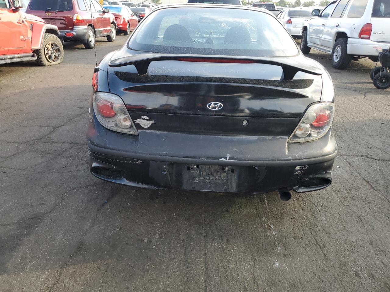 2001 Hyundai Tiburon  Black vin: KMHJG25F21U250094