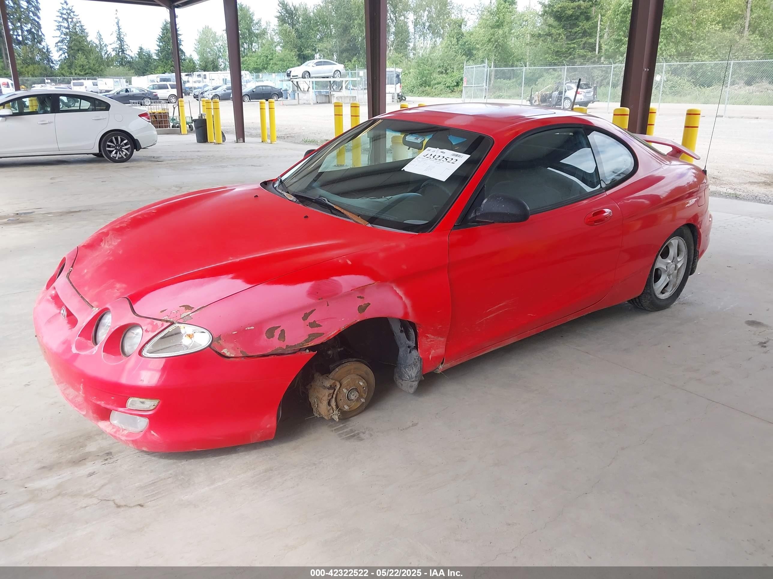 2000 Hyundai Tiburon Base Pkg 1, 2   5/base Pkg 3   4 Red vin: KMHJG25F5YU215267