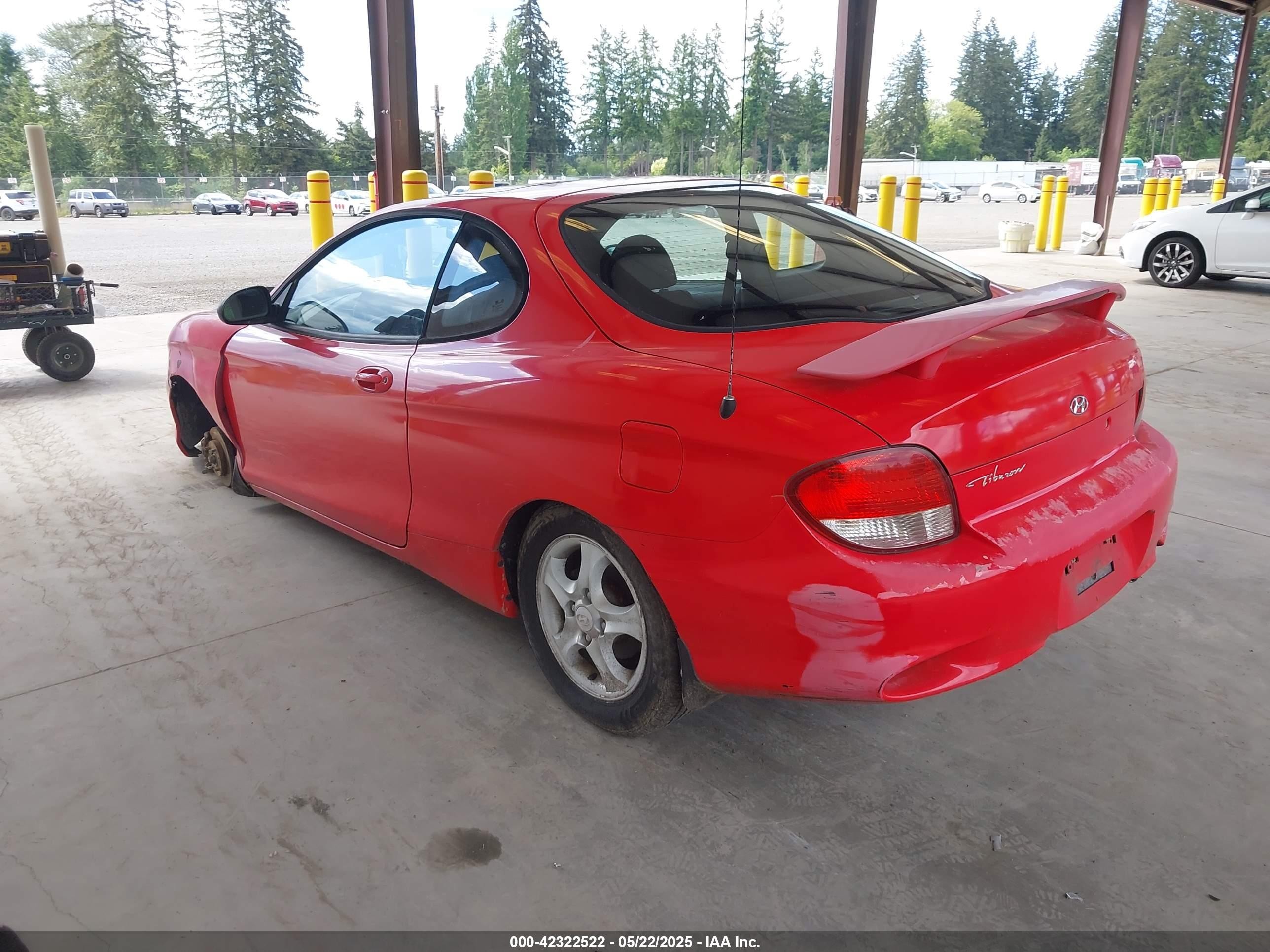 2000 Hyundai Tiburon Base Pkg 1, 2   5/base Pkg 3   4 Red vin: KMHJG25F5YU215267