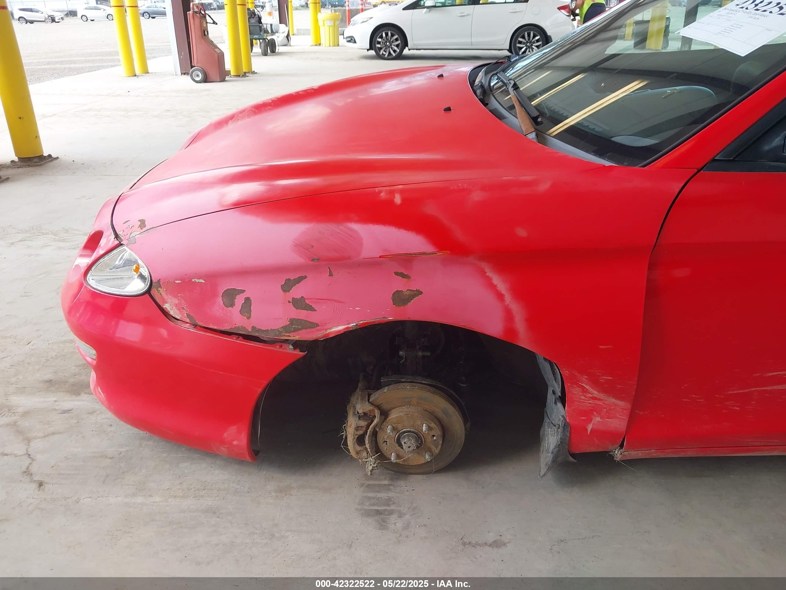 2000 Hyundai Tiburon Base Pkg 1, 2   5/base Pkg 3   4 Red vin: KMHJG25F5YU215267