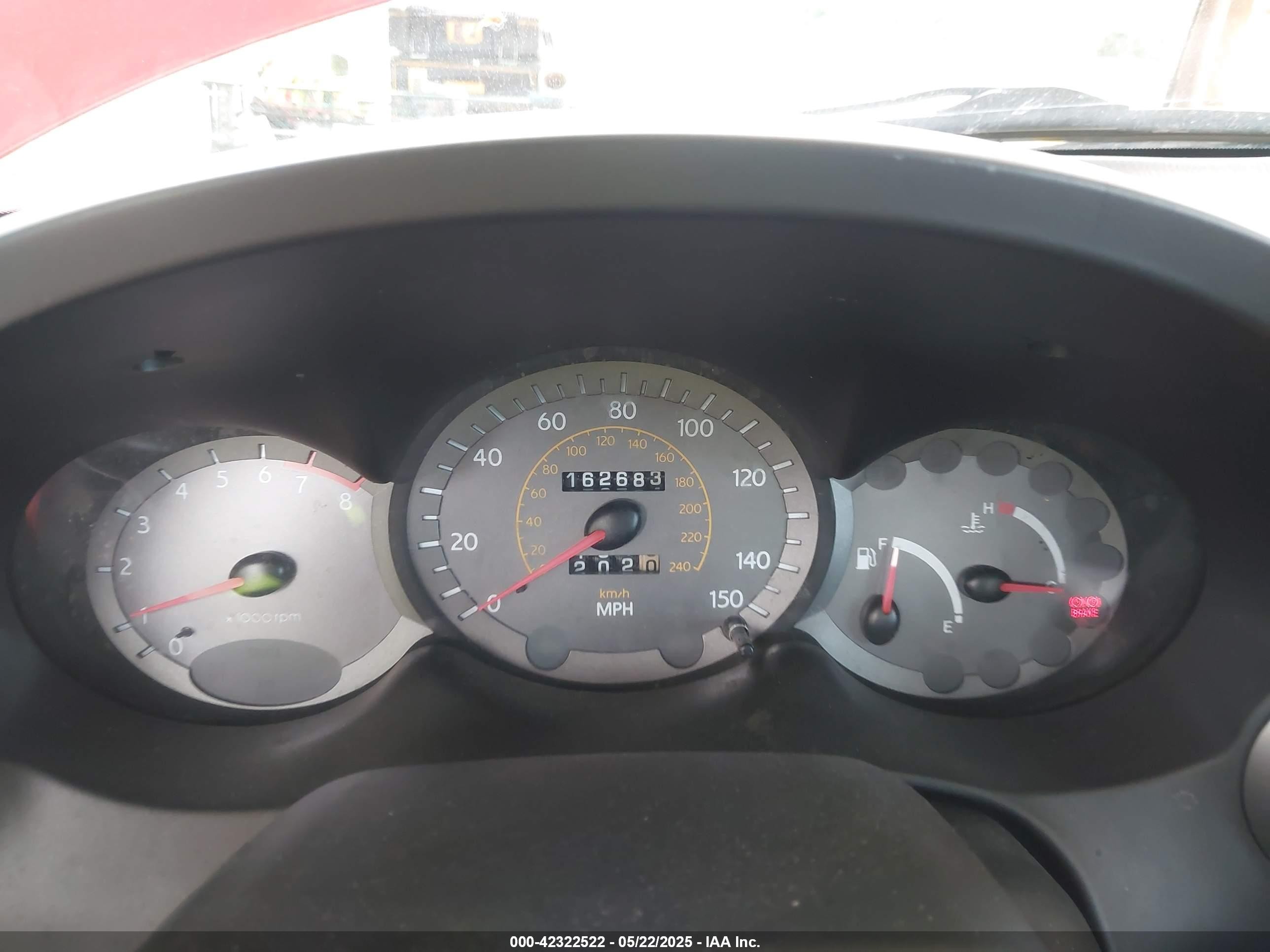 2000 Hyundai Tiburon Base Pkg 1, 2   5/base Pkg 3   4 Red vin: KMHJG25F5YU215267