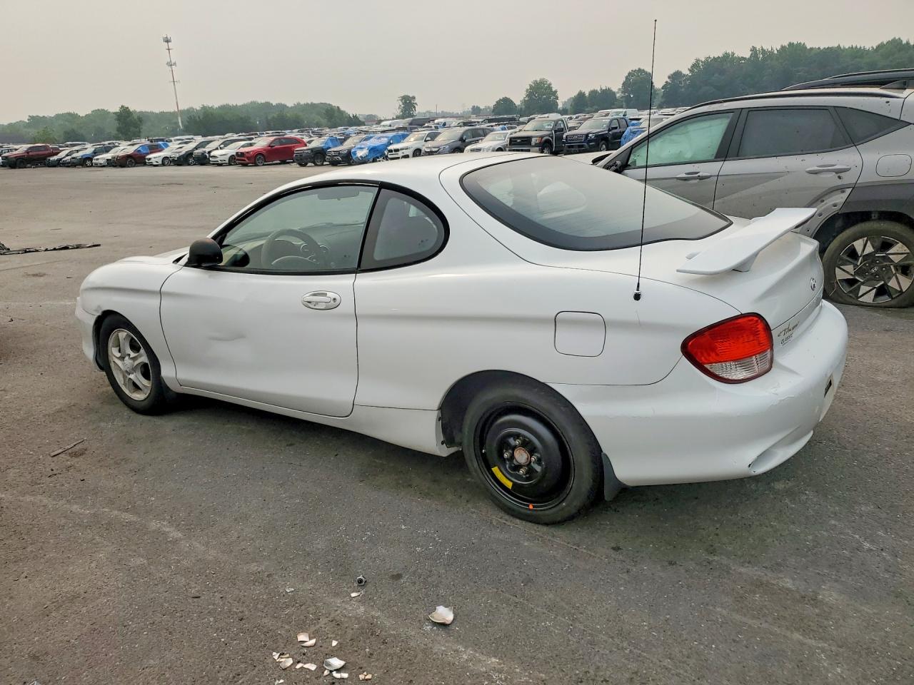 2000 Hyundai Tiburon Base White vin: KMHJG25F9YU217491