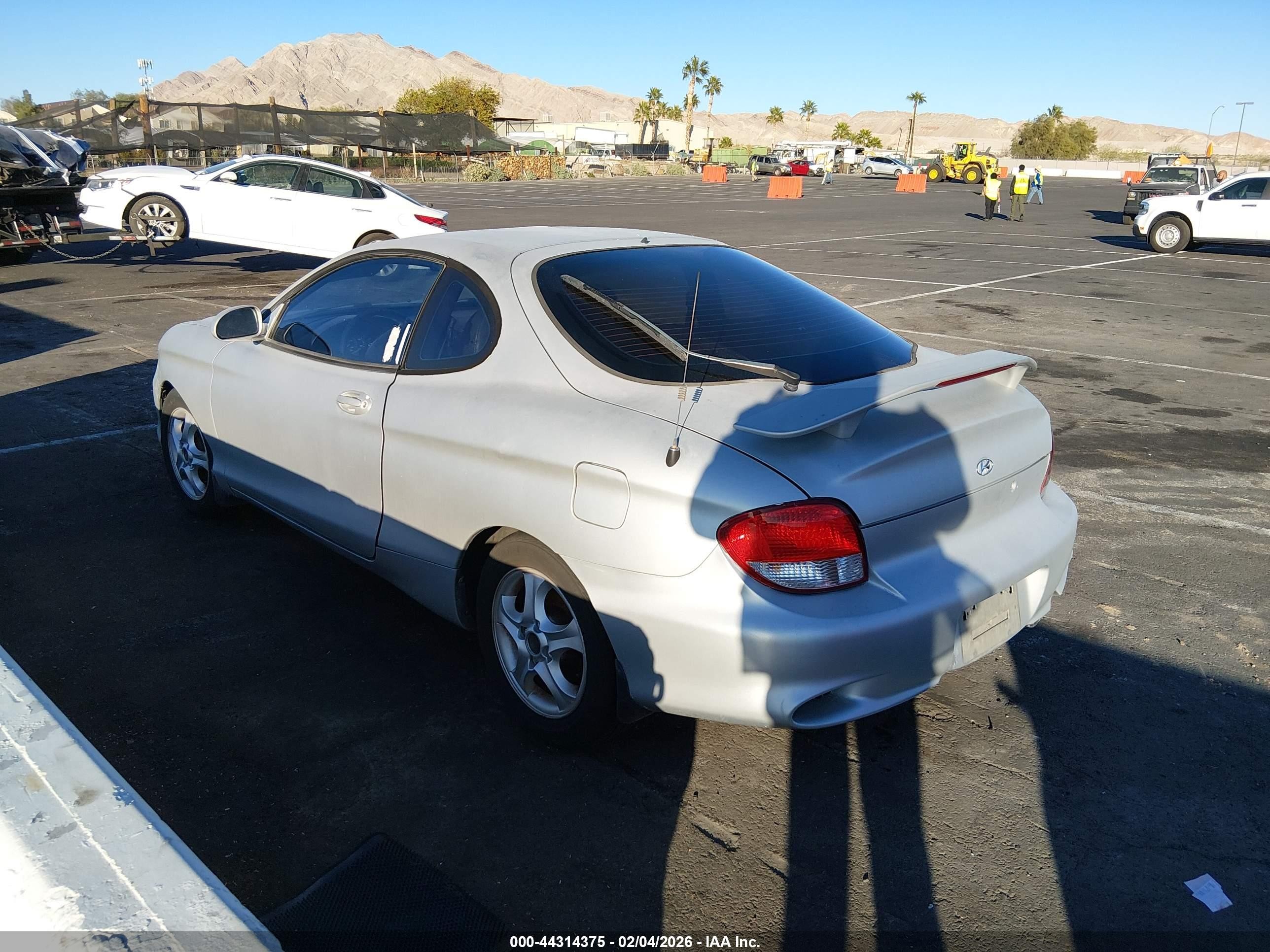 2001 Hyundai Tiburon Base Pkg 1   2 Gray vin: KMHJG35F11U244275