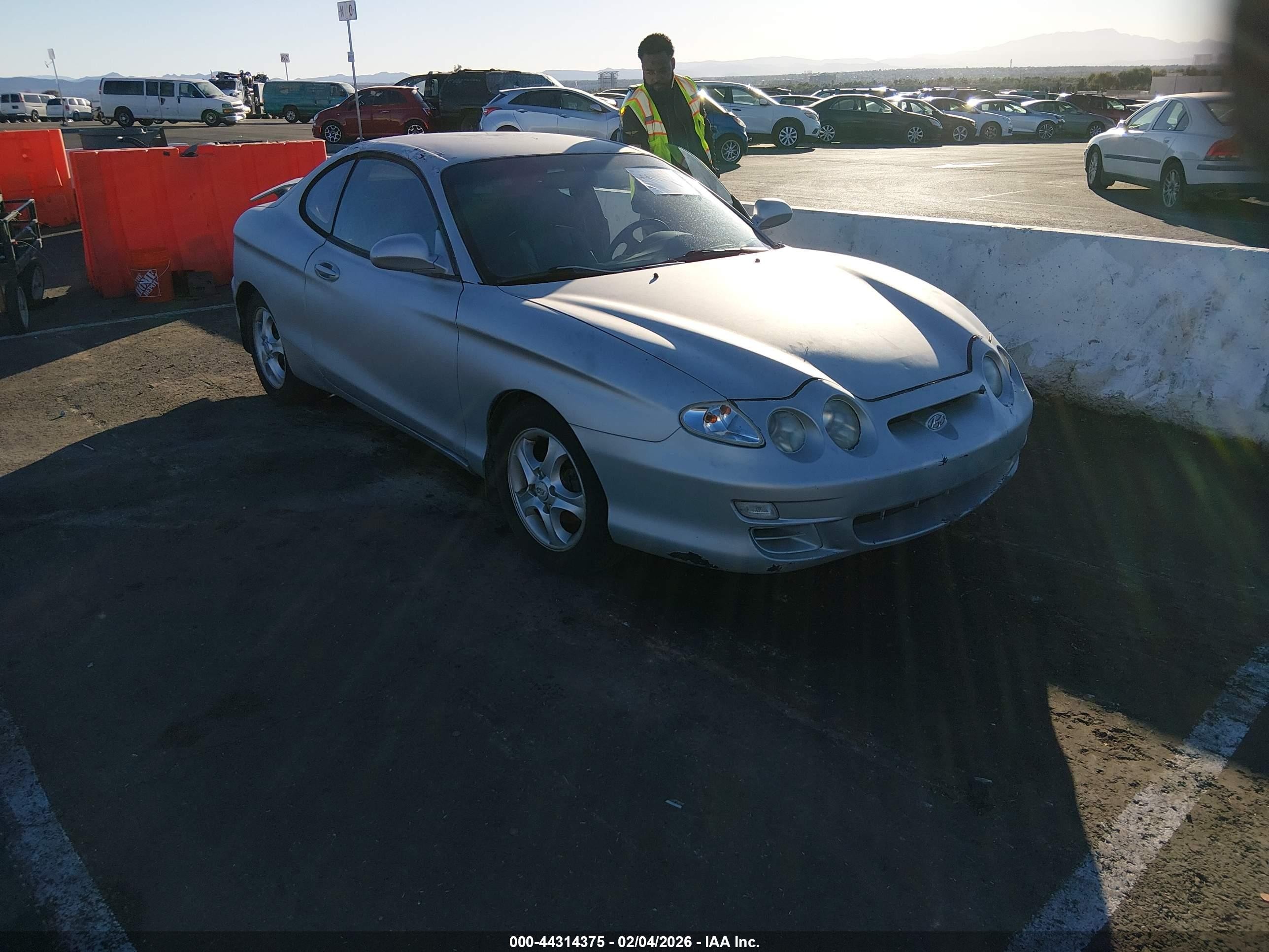 2001 Hyundai Tiburon Base Pkg 1   2 Gray vin: KMHJG35F11U244275