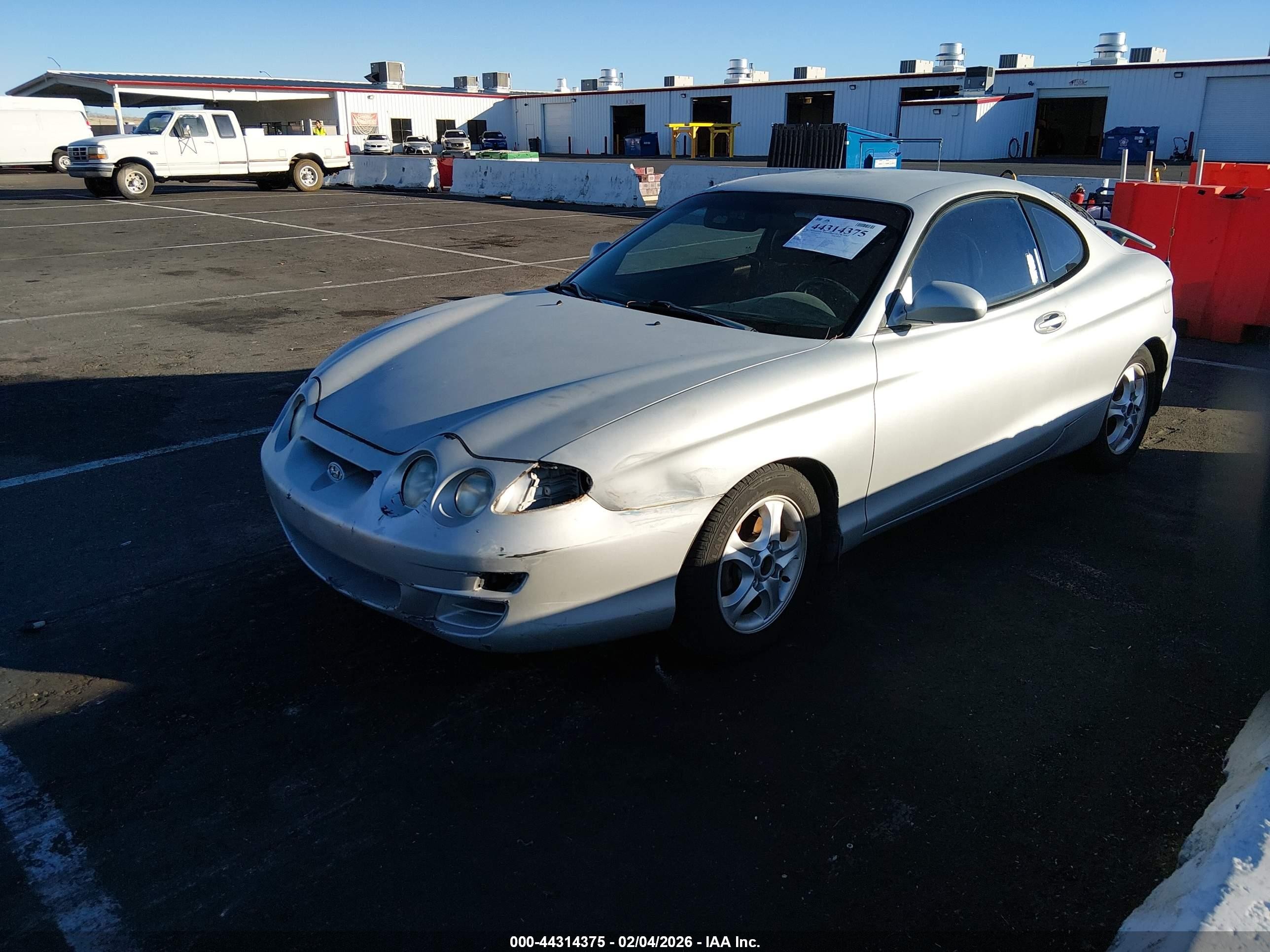 2001 Hyundai Tiburon Base Pkg 1   2 Gray vin: KMHJG35F11U244275
