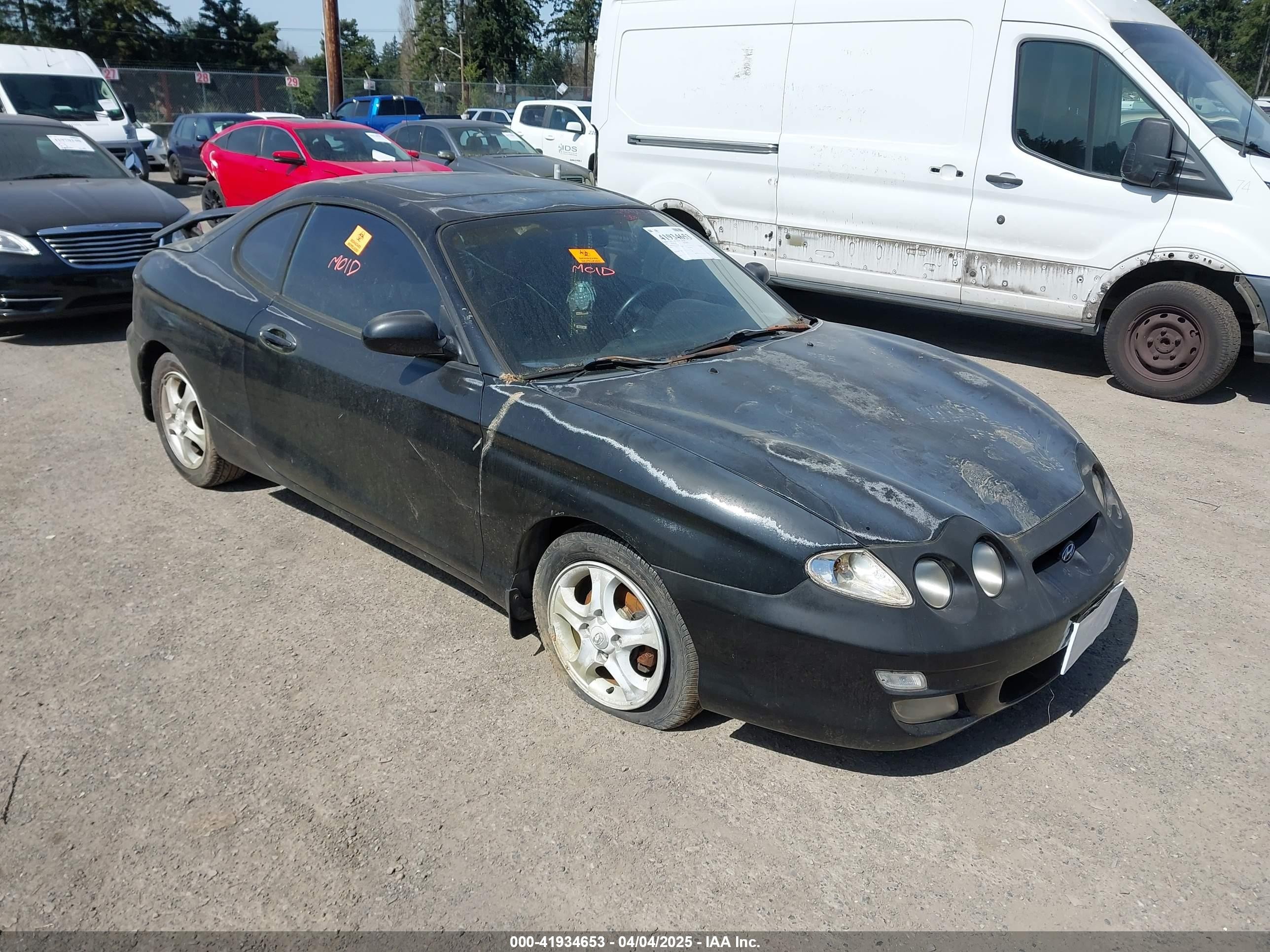 2000 Hyundai Tiburon   Black vin: KMHJG35F5YU191588
