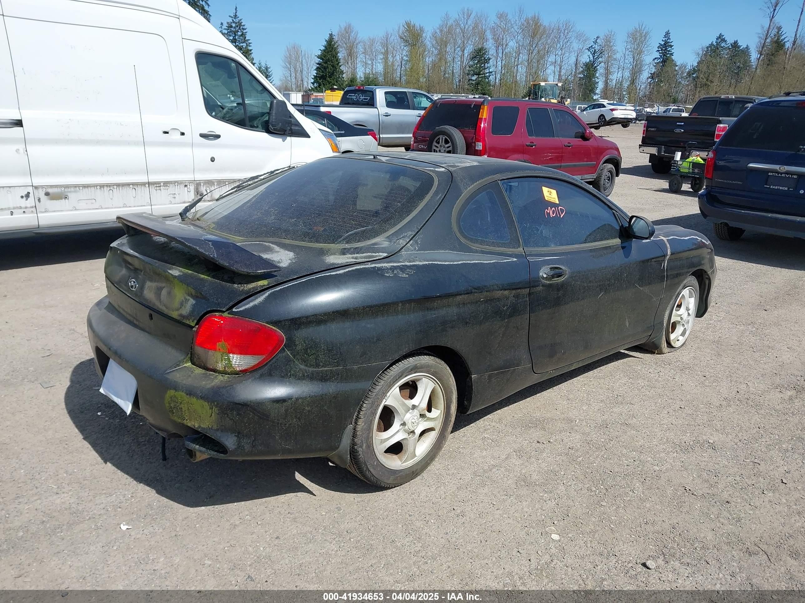 2000 Hyundai Tiburon   Black vin: KMHJG35F5YU191588