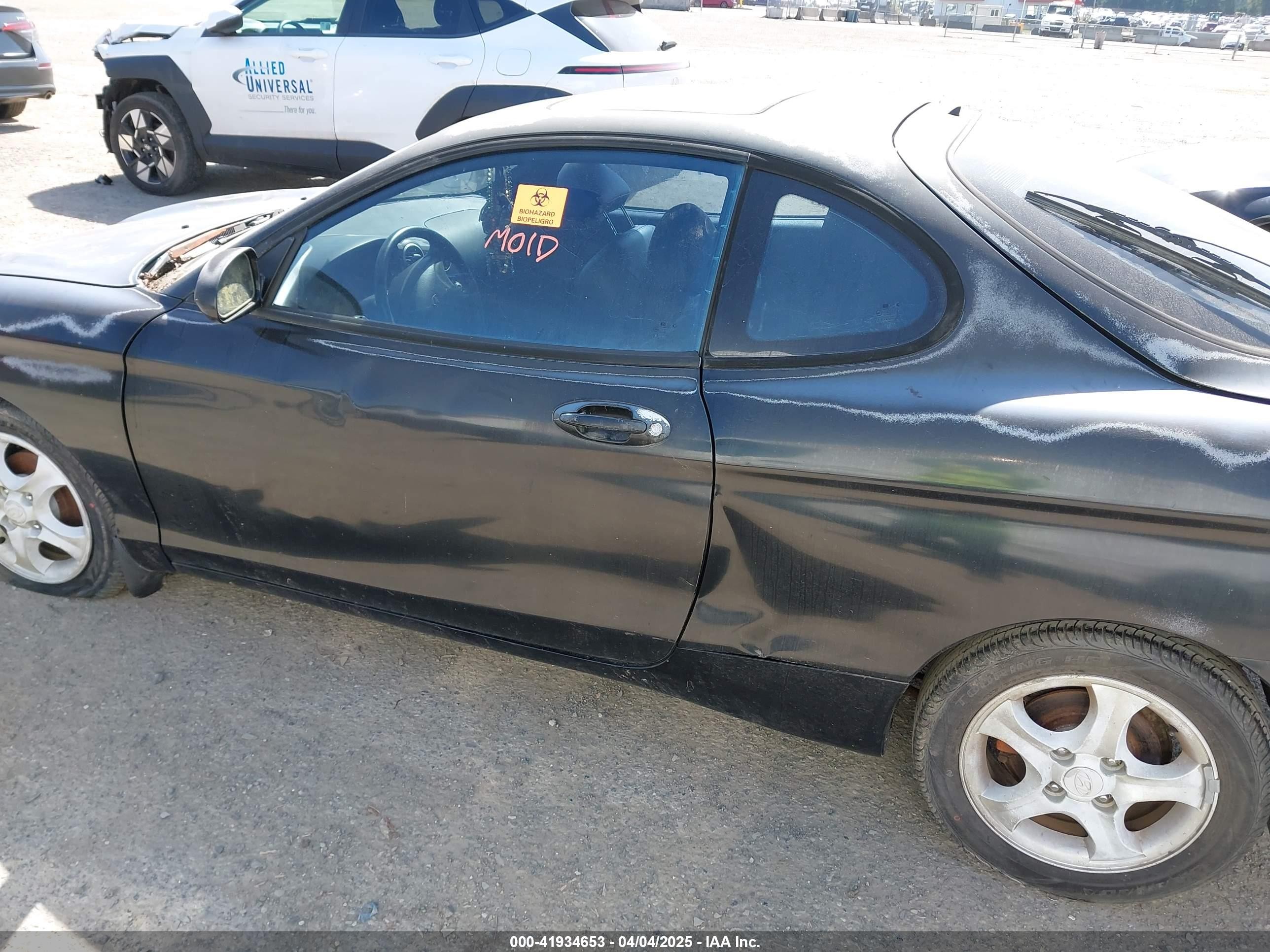 2000 Hyundai Tiburon   Black vin: KMHJG35F5YU191588