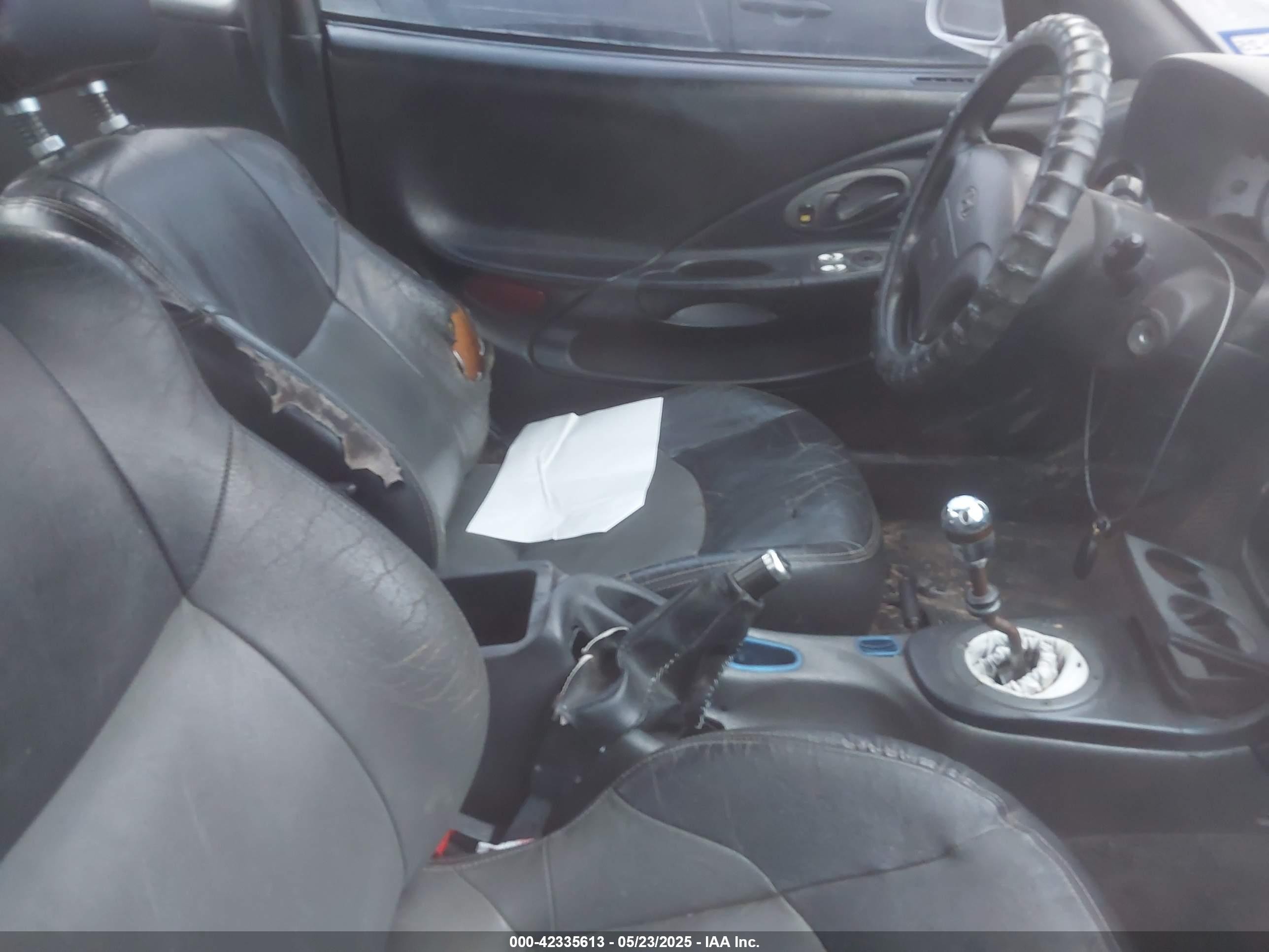 2000 Hyundai Tiburon Base Pkg 1, 2   5/base Pkg 3   4 White vin: KMHJG35F6YU167638