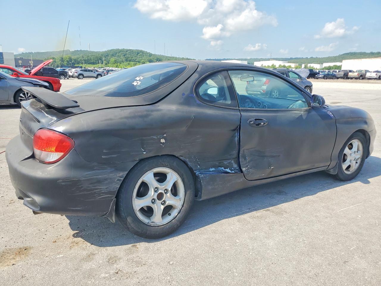 2000 Hyundai Tiburon Base Black vin: KMHJG35F6YU198209