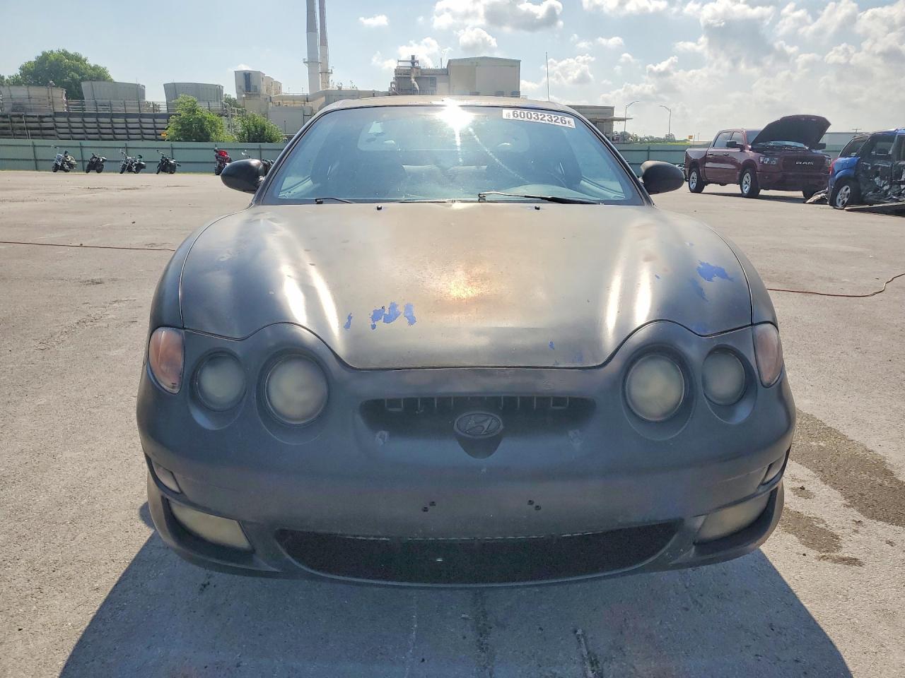 2000 Hyundai Tiburon Base Black vin: KMHJG35F6YU198209