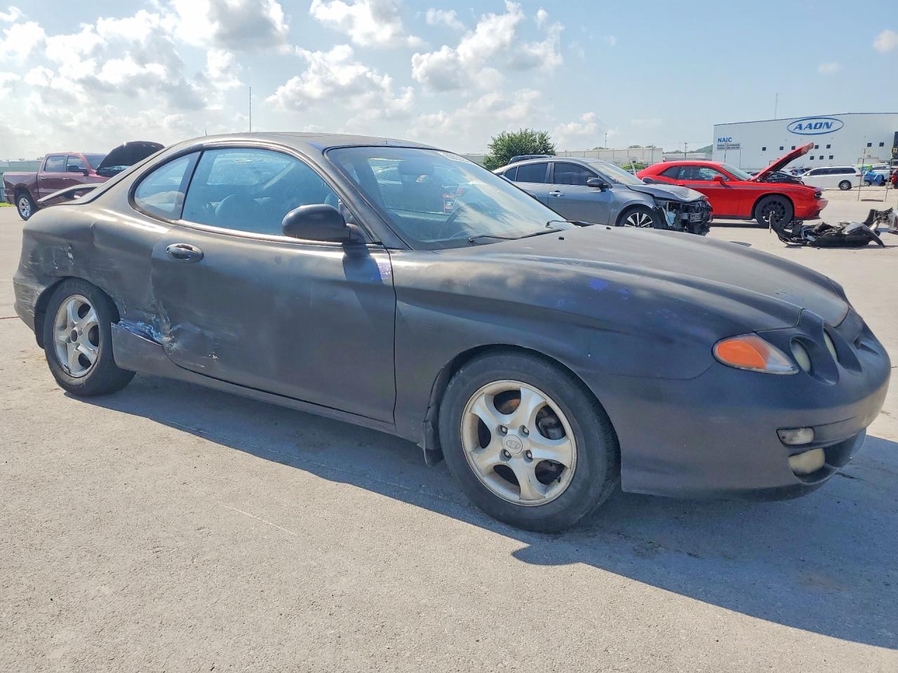 2000 Hyundai Tiburon Base Black vin: KMHJG35F6YU198209