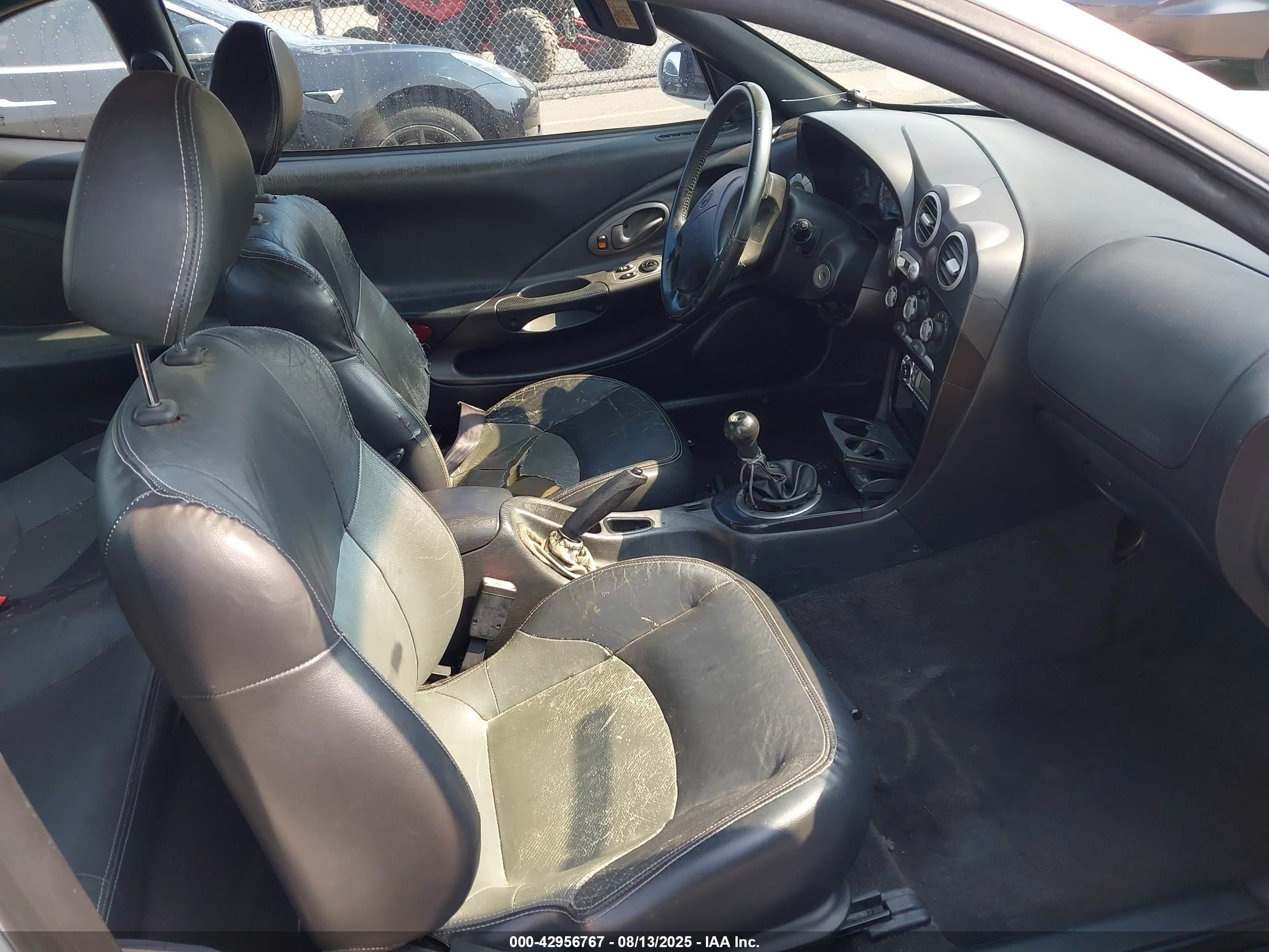 2000 Hyundai Tiburon Base Pkg 1, 2   5/base Pkg 3   4 White vin: KMHJG35F6YU202467