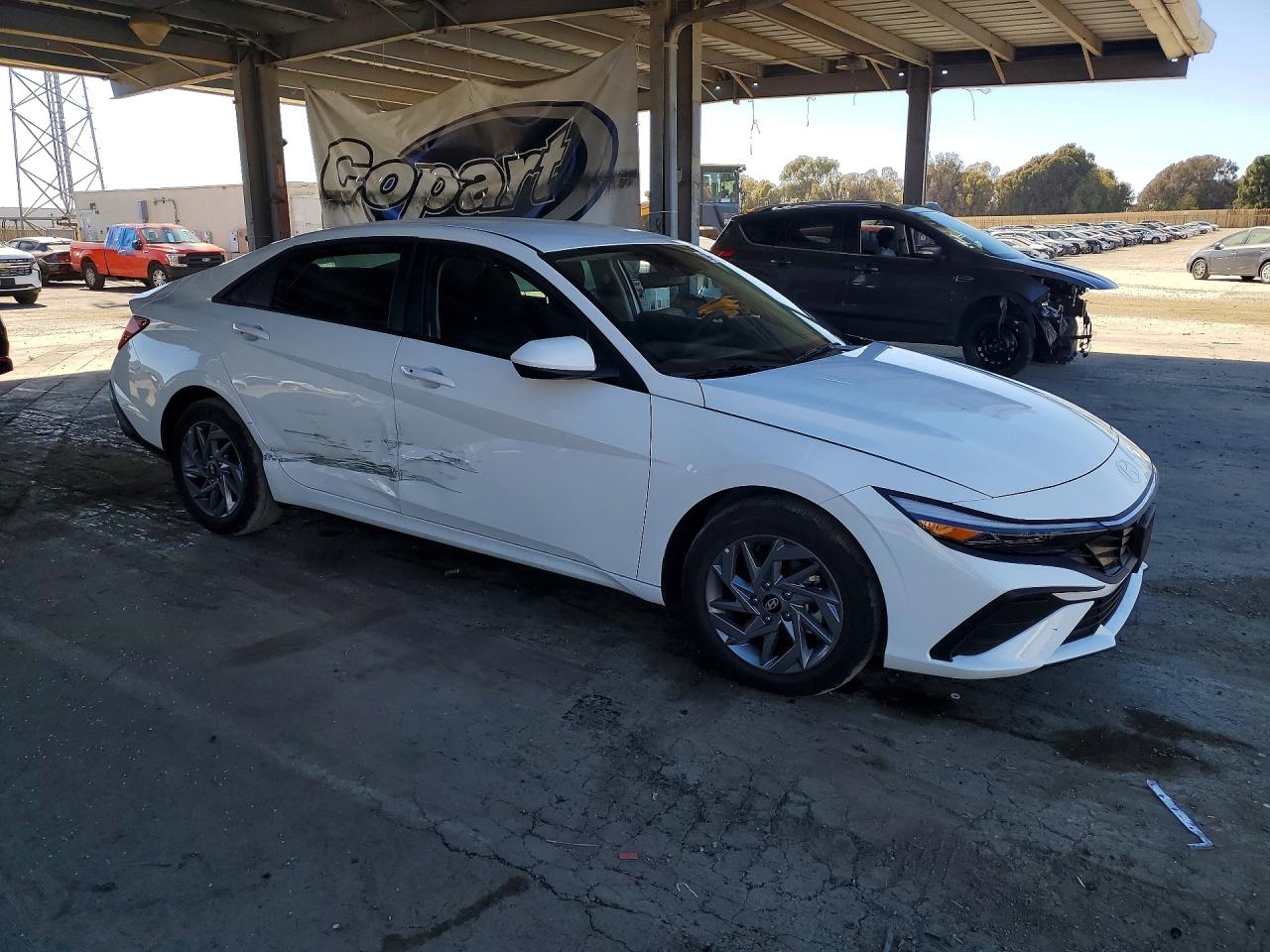 2026 Hyundai Elantra Hybrid Blue White vin: KMHLM4DJXTU205698