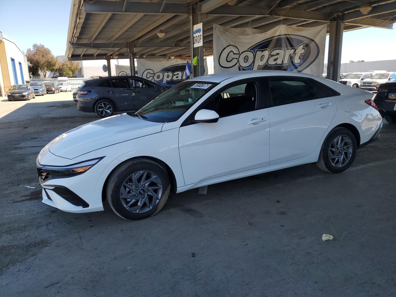 2026 Hyundai Elantra Hybrid Blue White vin: KMHLM4DJXTU205698 Damage: Left Front Window, Missing, Replacement Required