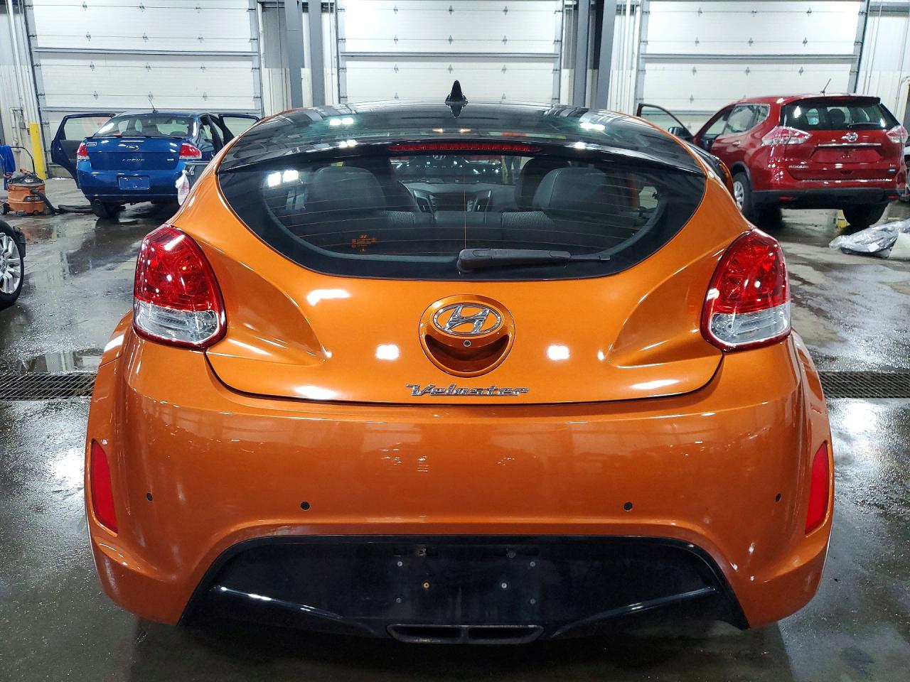 2012 Hyundai Veloster Base Orange vin: KMHTC6AD0CU031427