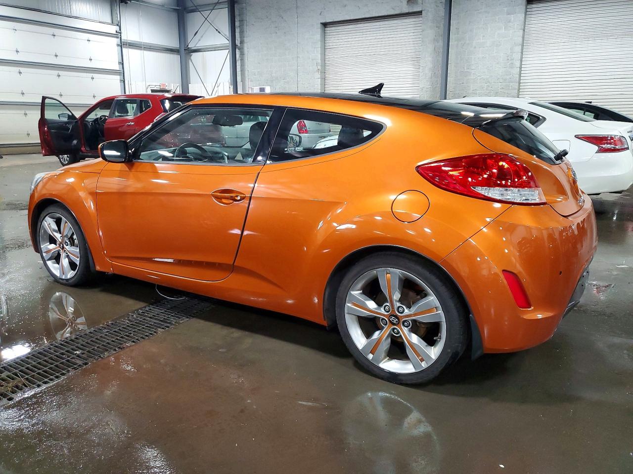 2012 Hyundai Veloster Base Orange vin: KMHTC6AD0CU031427