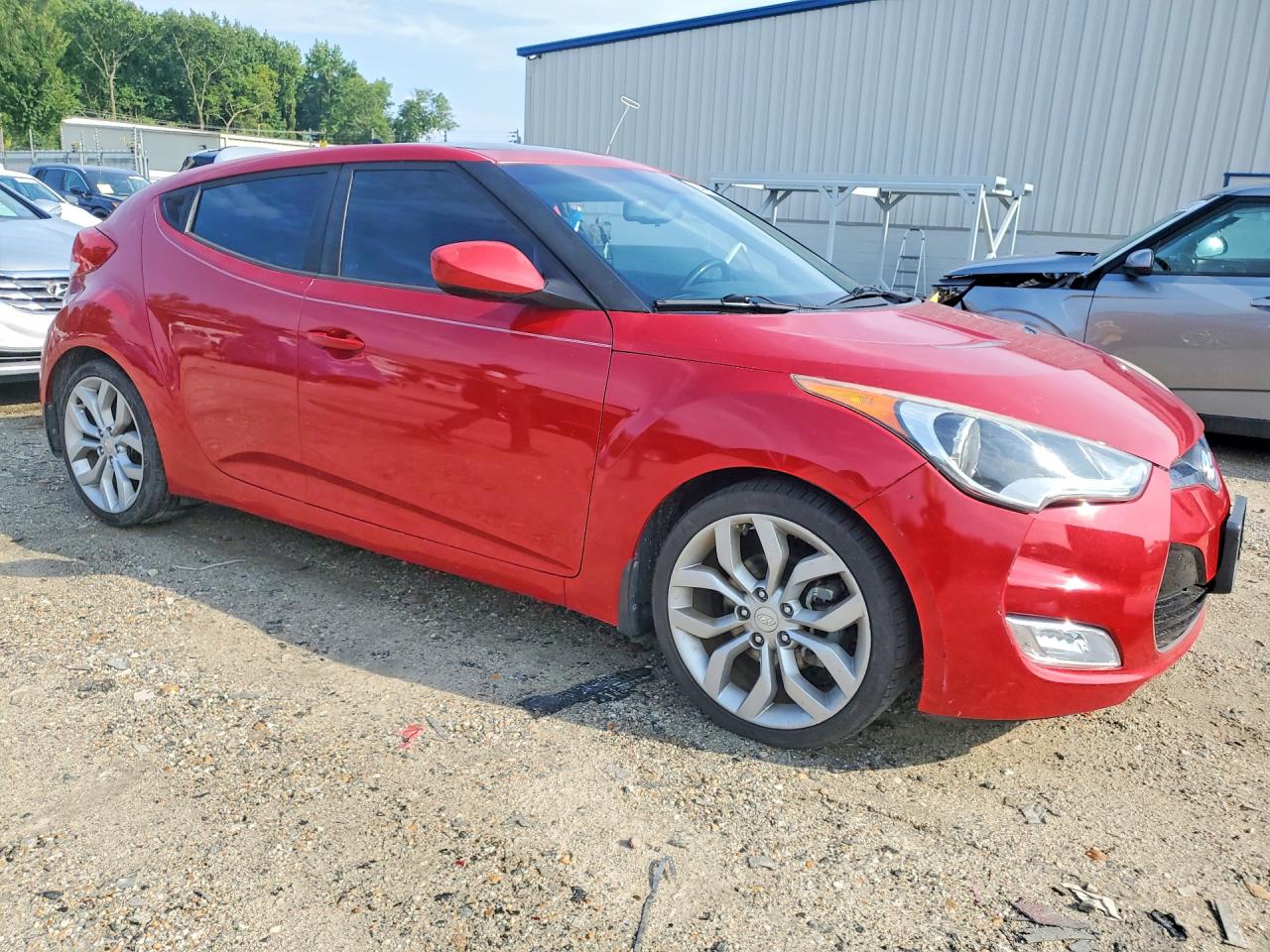 2015 Hyundai Veloster Base Red vin: KMHTC6AD1FU244004