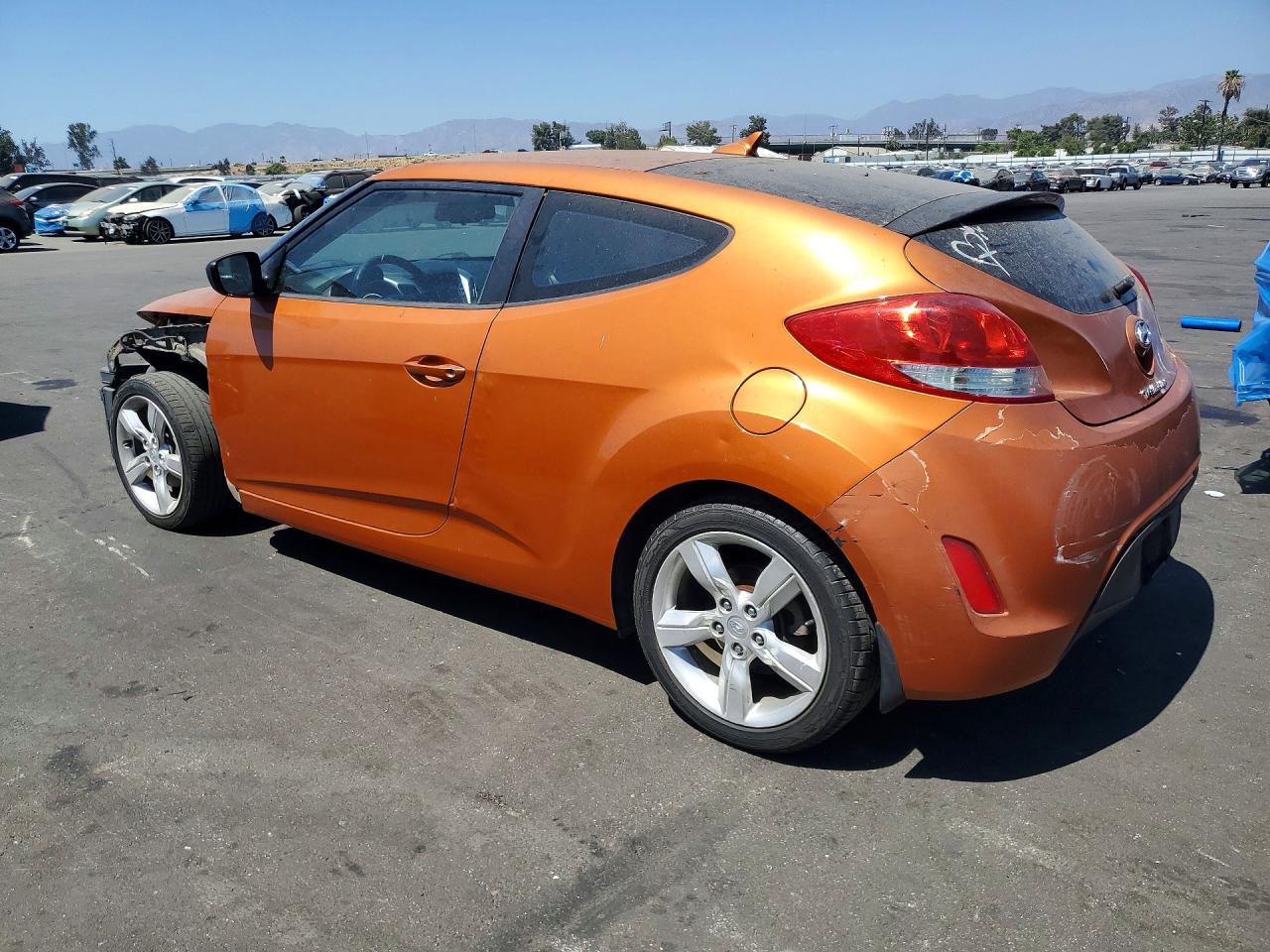 2012 Hyundai Veloster Base Orange vin: KMHTC6AD5CU029947