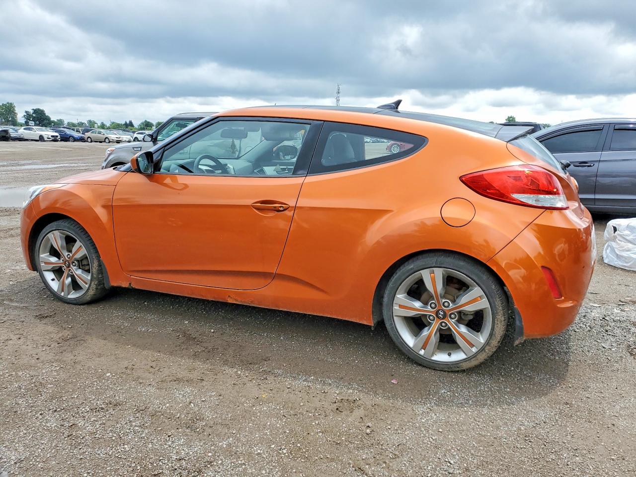 2012 Hyundai Veloster Base Оранжевый vin: KMHTC6AD7CU023812