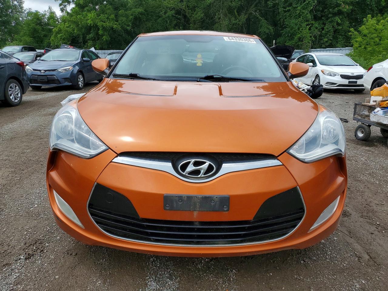 2012 Hyundai Veloster Base Оранжевый vin: KMHTC6AD7CU023812