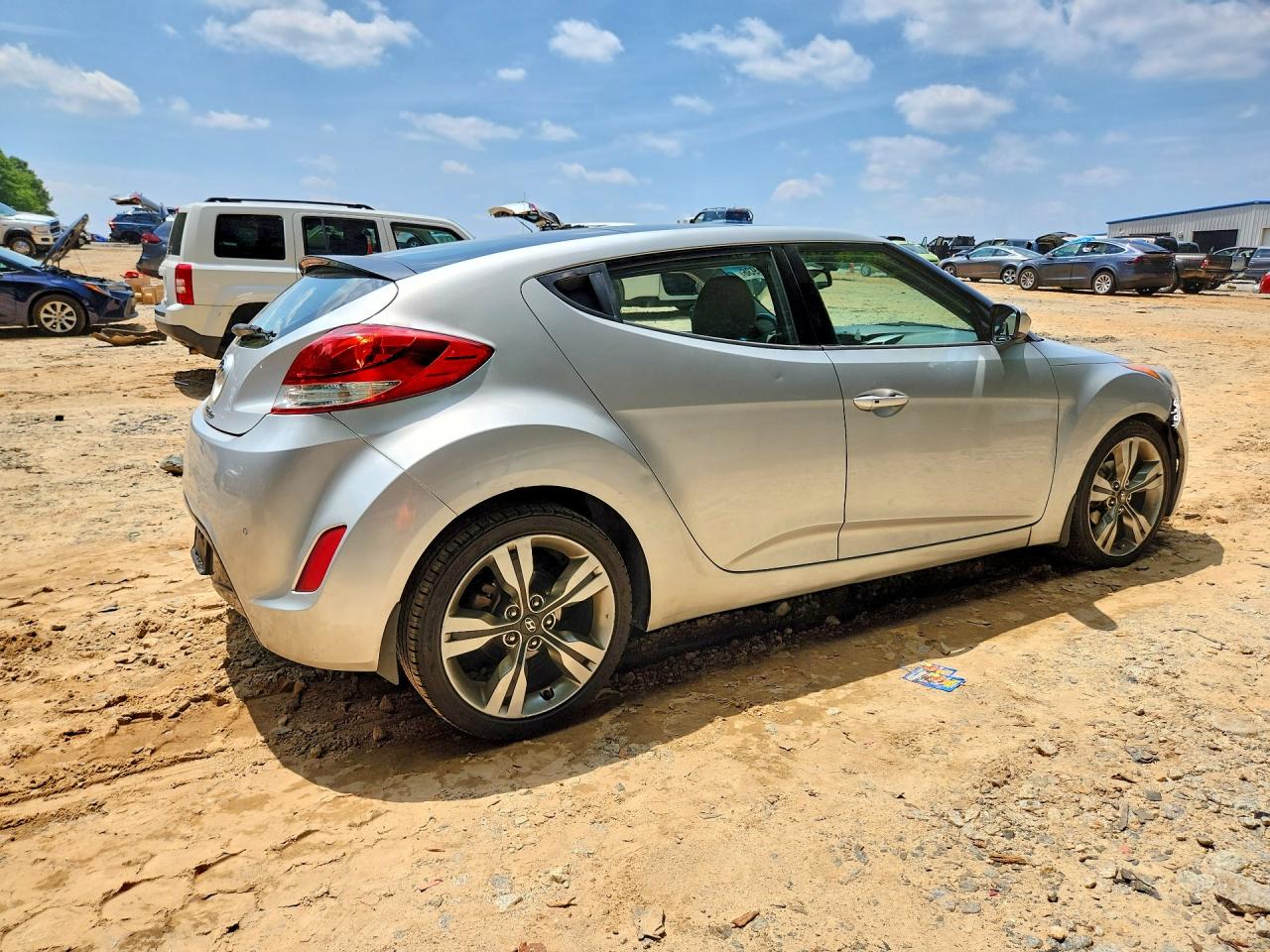 2012 Hyundai Veloster Base Серебряный vin: KMHTC6AD7CU058706