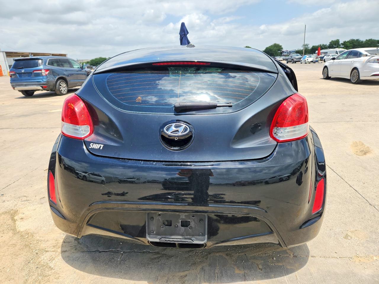 2015 Hyundai Veloster Base Черный vin: KMHTC6AD8FU234022