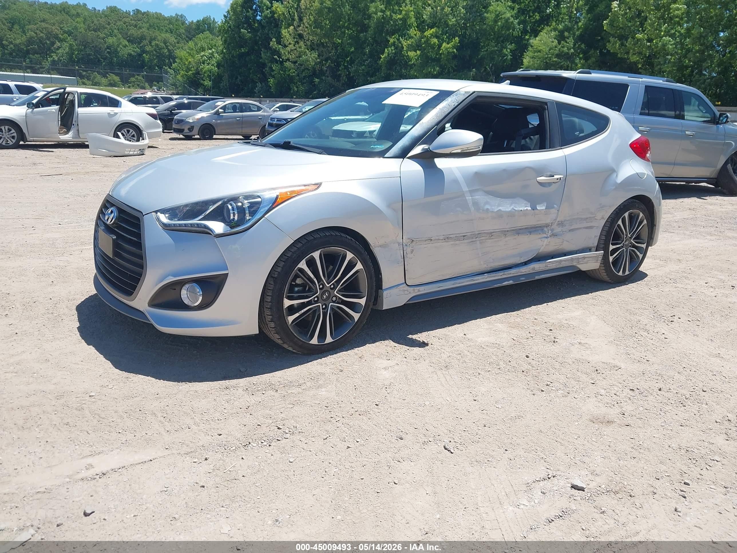 2016 Hyundai Veloster Turbo Серебряный vin: KMHTC6AE2GU272887