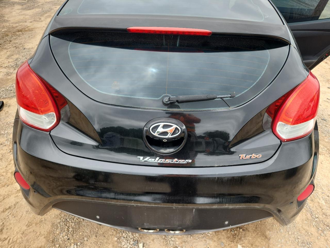2015 Hyundai Veloster Turbo Black vin: KMHTC6AE3FU249259 Damage: Right Tail Light, Chipped, Replacement Required