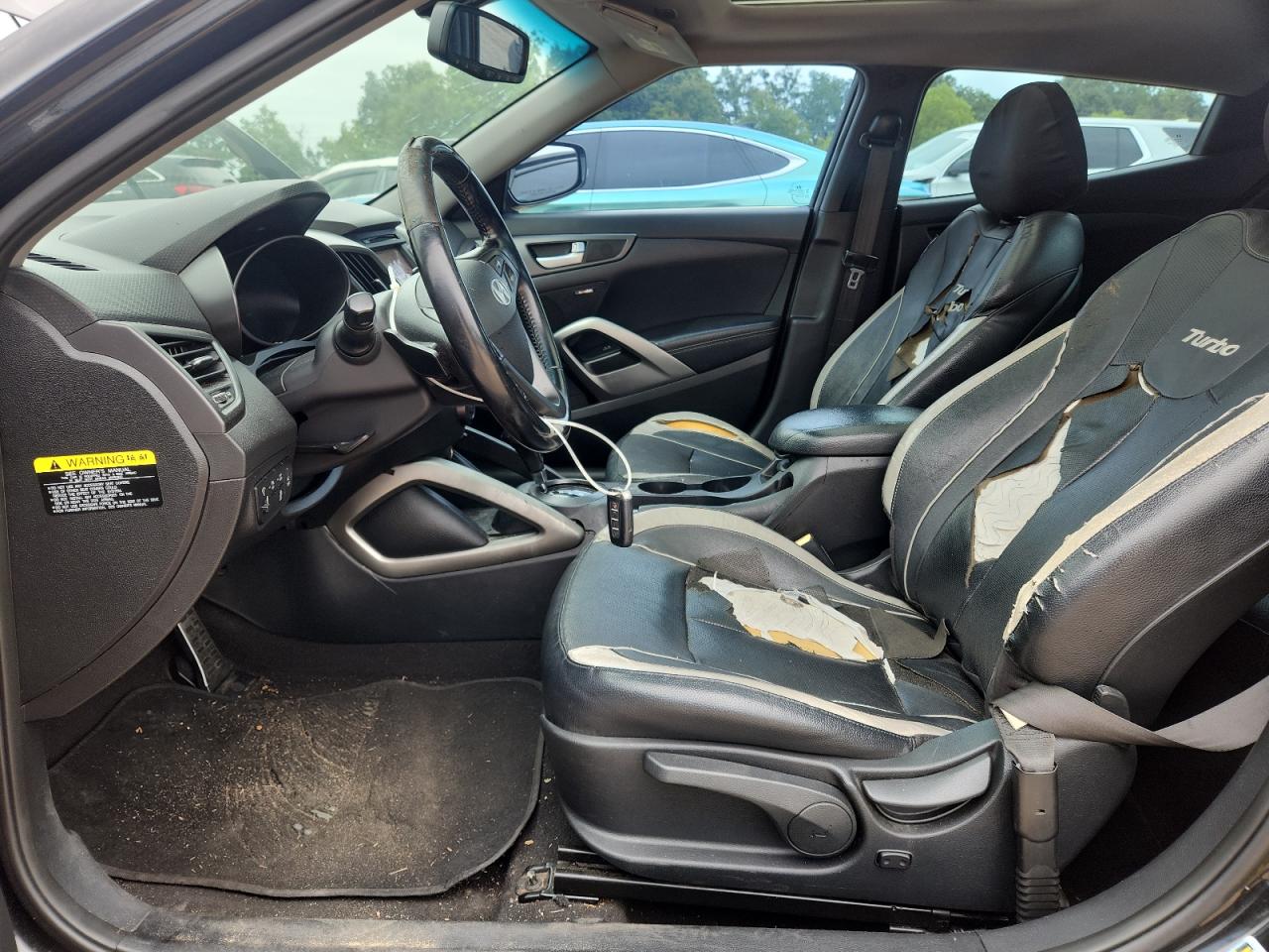 2015 Hyundai Veloster Turbo Black vin: KMHTC6AE3FU249259 Damage: Steering Wheel, Worn, Replacement Required