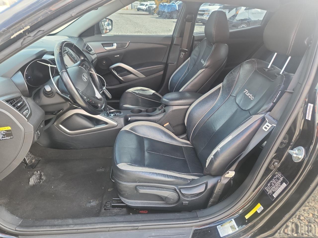 2015 Hyundai Veloster Turbo Black vin: KMHTC6AE4FU231787 Damage: Left Front Seat, Torn, > 12 Inches