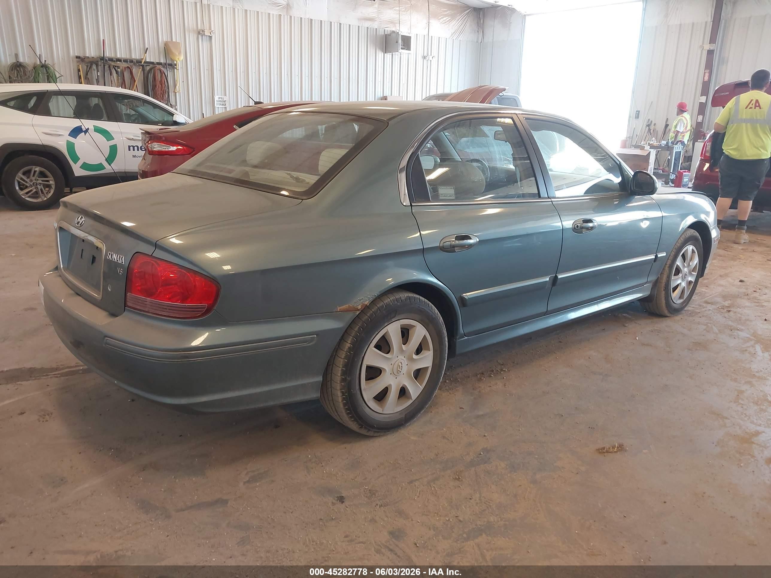 2004 Hyundai Sonata   Light Blue vin: KMHWF25H94A006572
