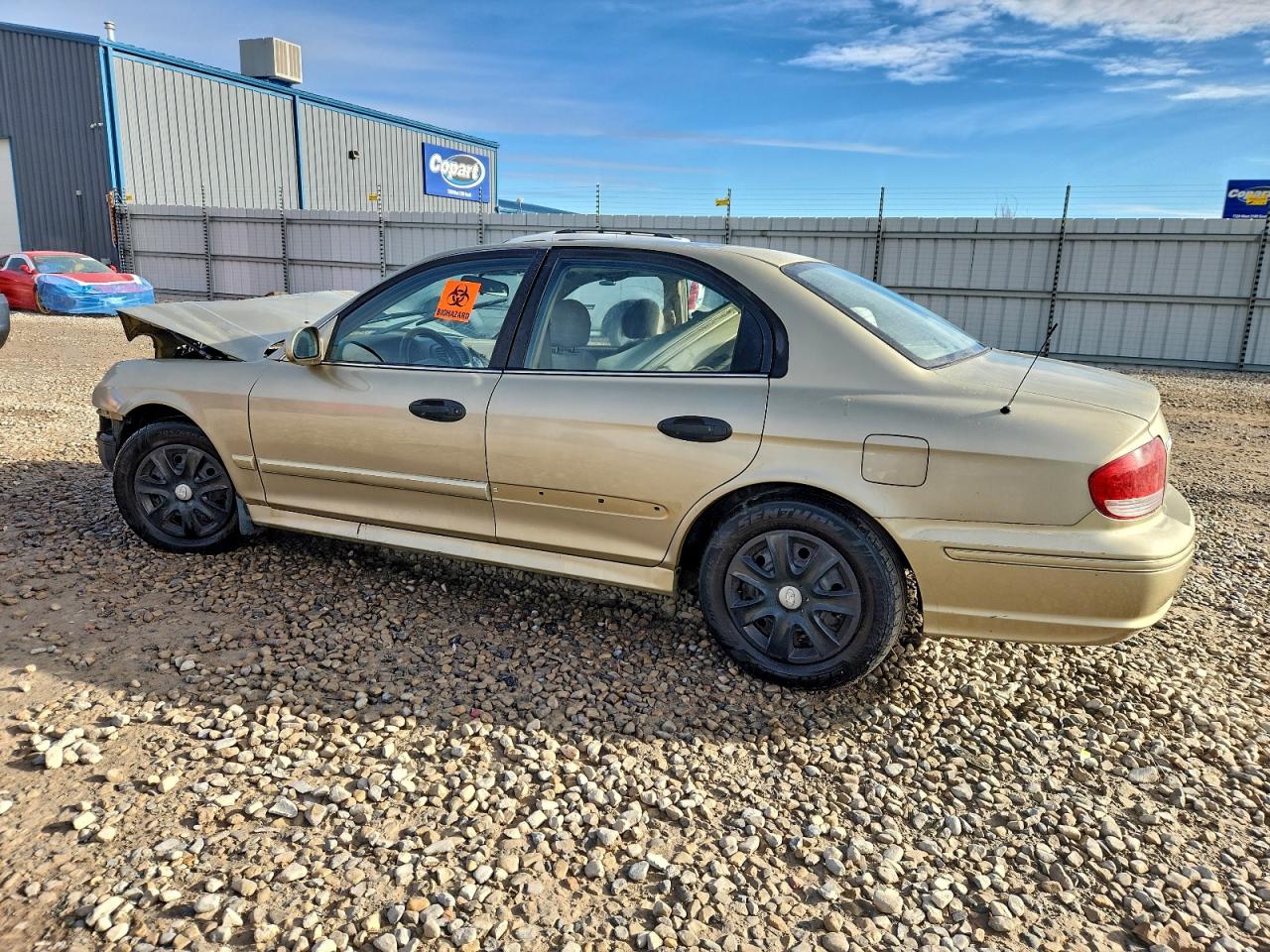 2002 Hyundai Sonata Base Tan vin: KMHWF25S42A668777