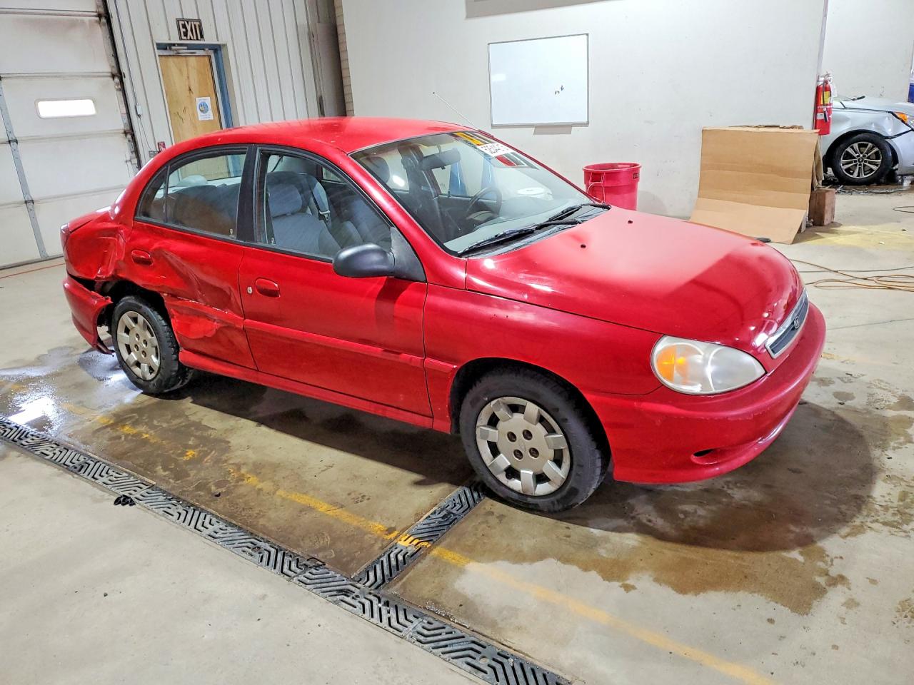 2002 Kia Rio Base Red vin: KNADC123126175702