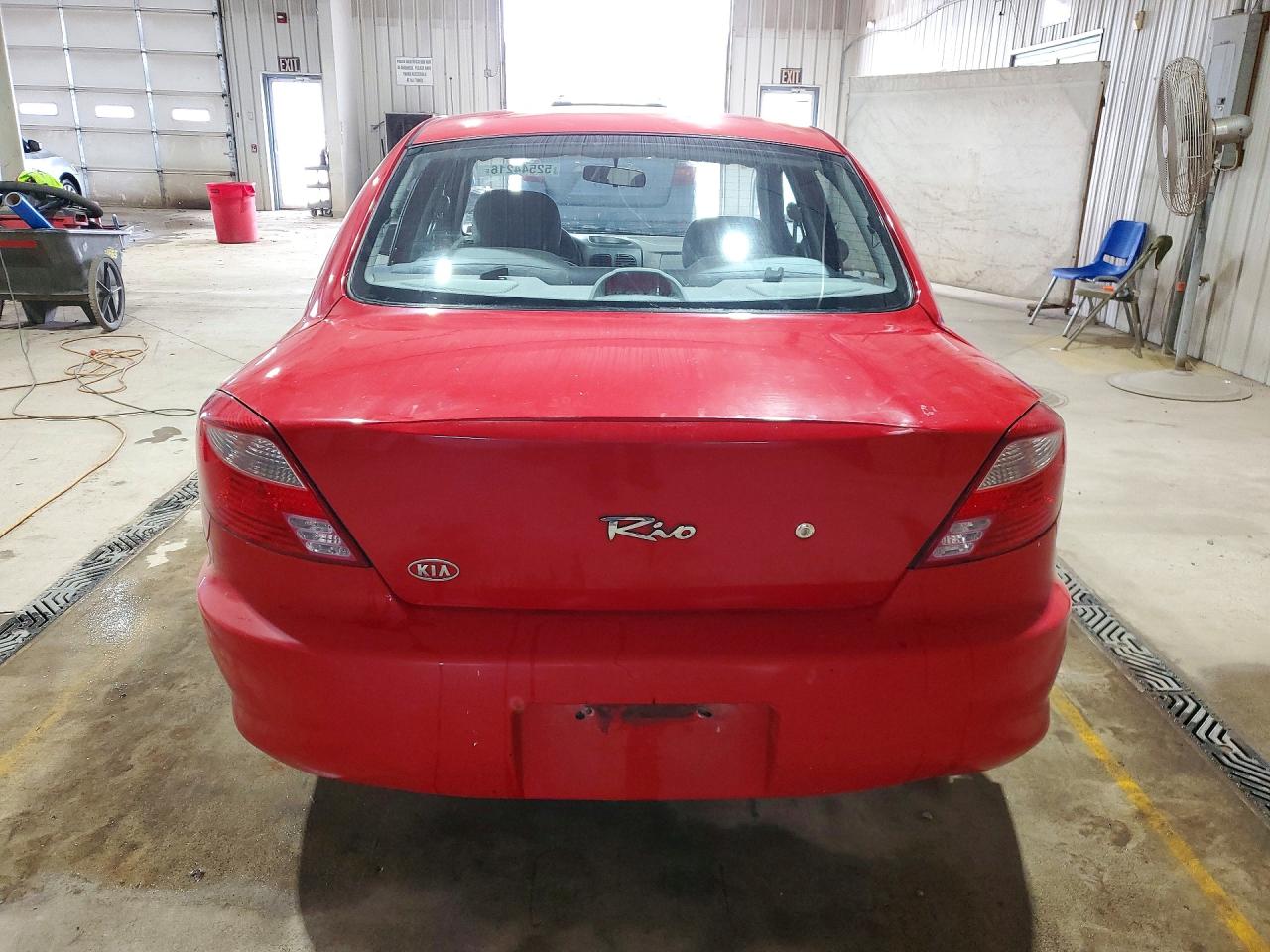 2002 Kia Rio Base Red vin: KNADC123126175702