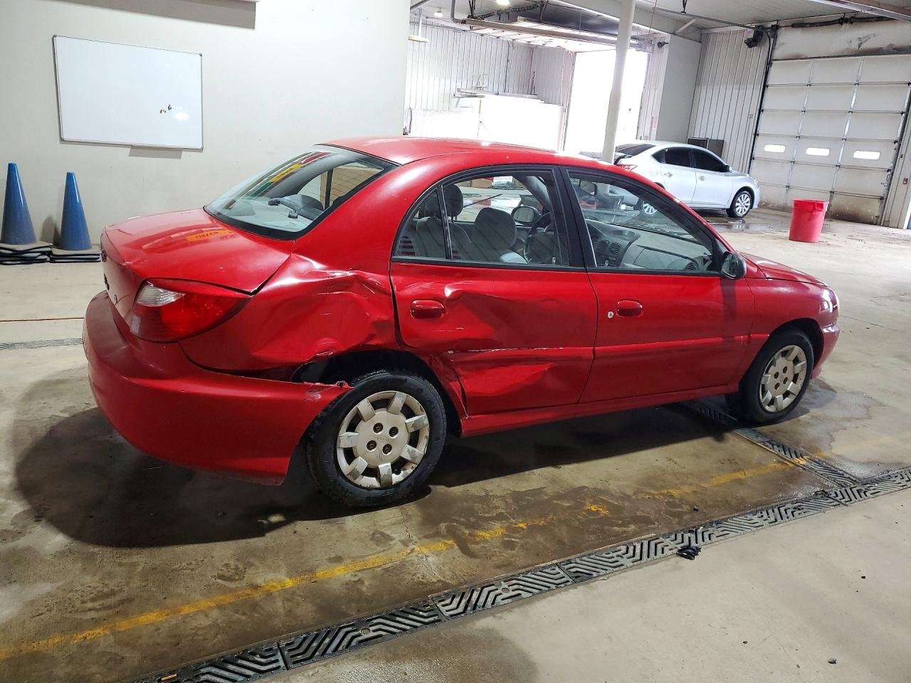 2002 Kia Rio Base Red vin: KNADC123126175702